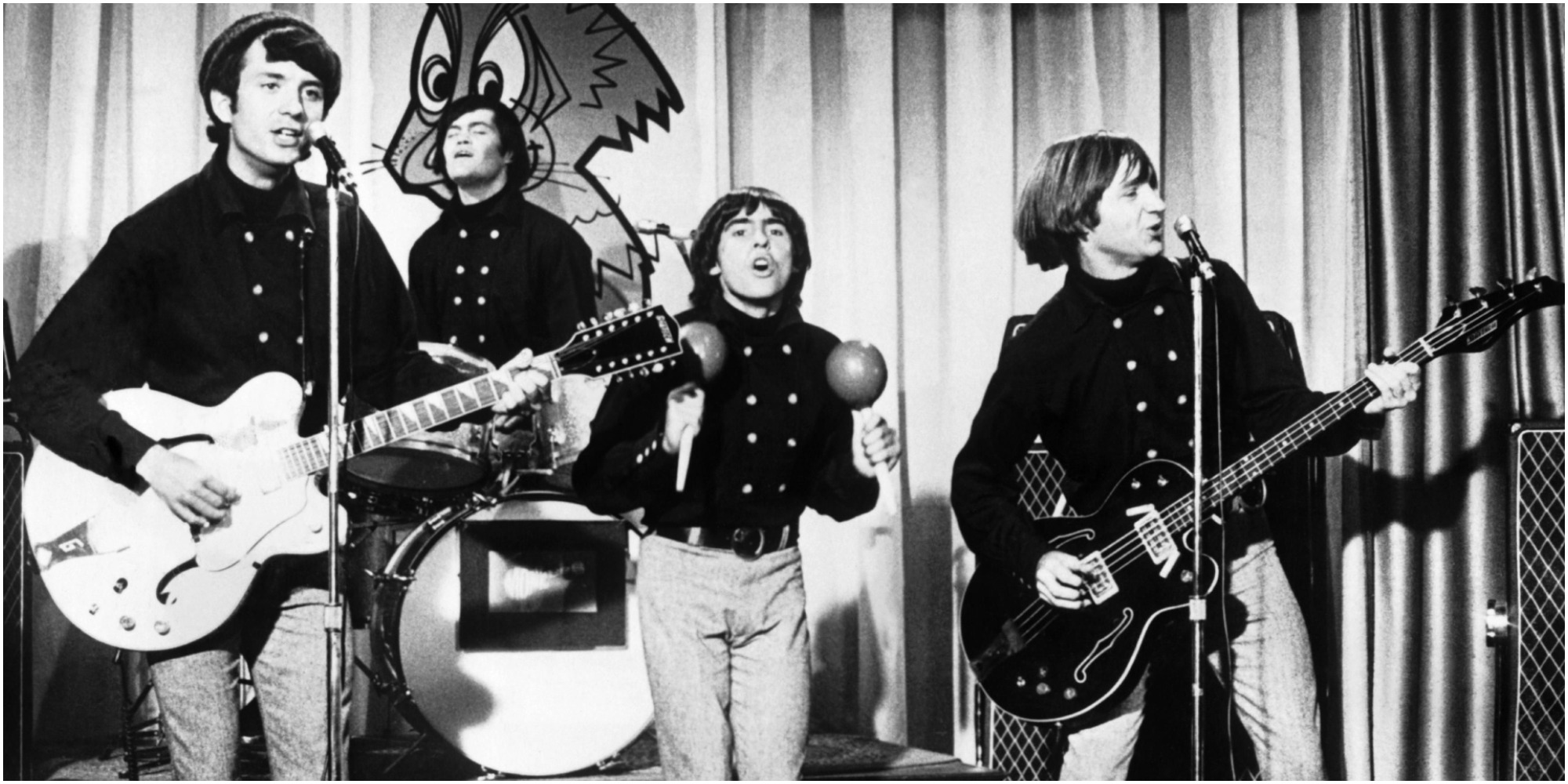 The Monkees perform on the set of their television show in 1967.