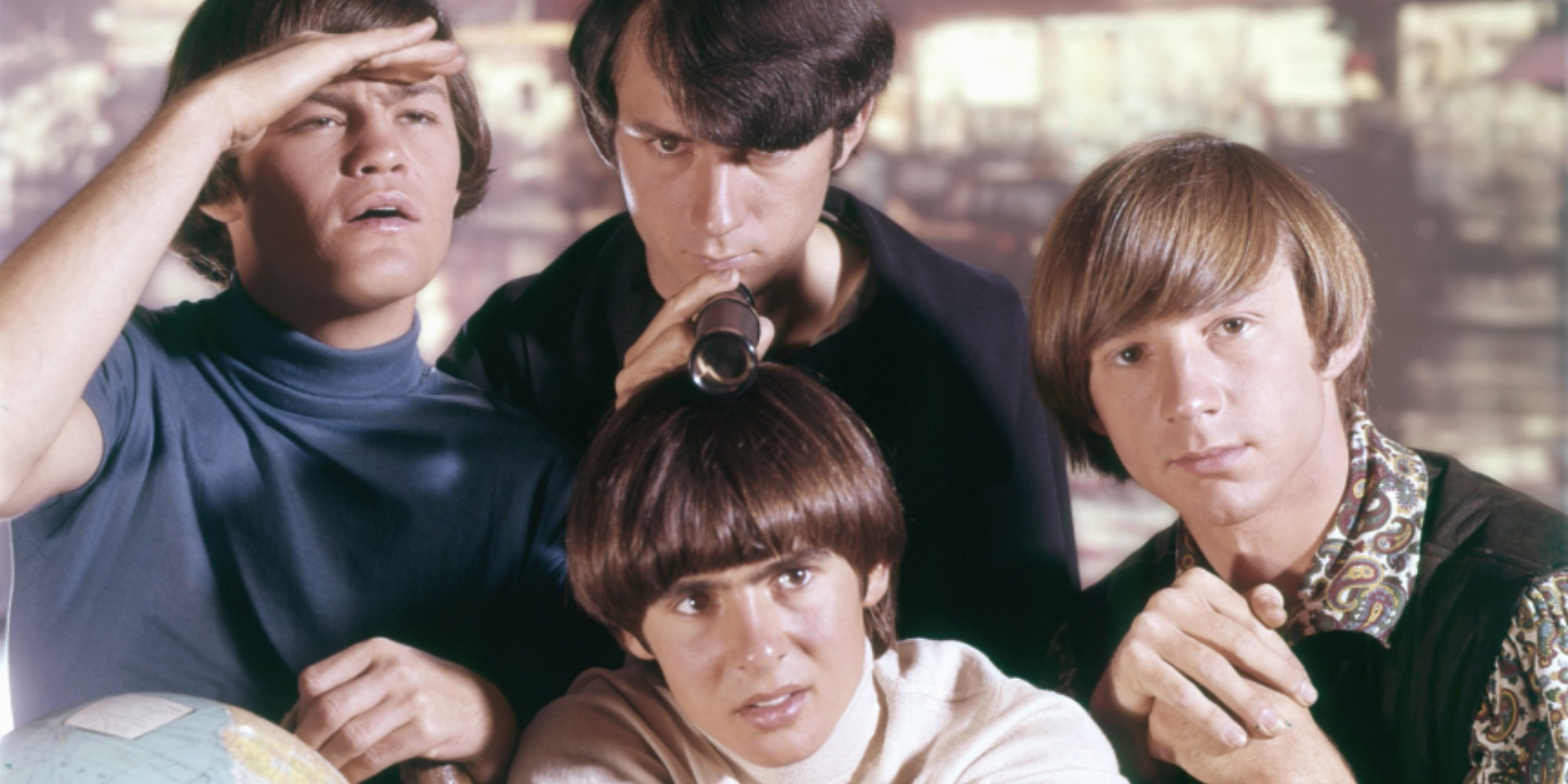 The Monkees cast includes Davy Jones, Mike Nesmith, Mickey Dolenz, and Peter Tork.