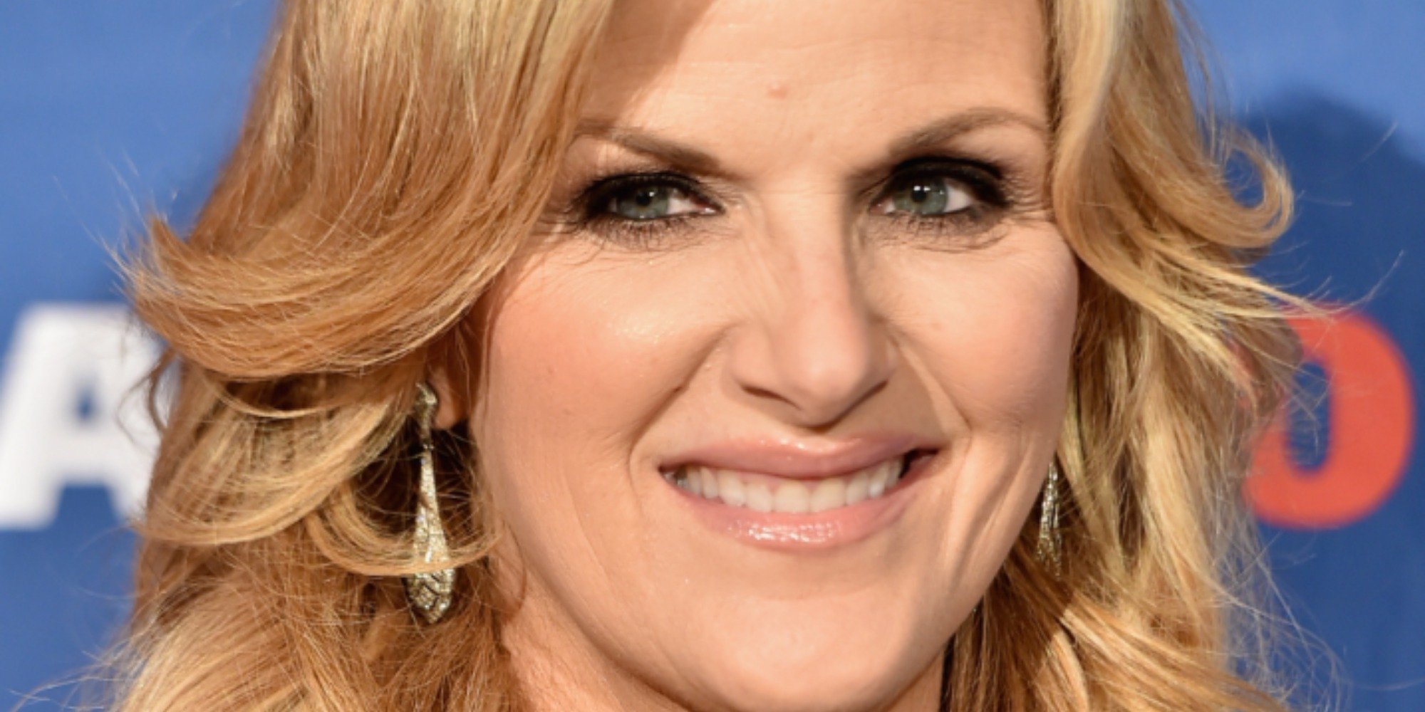 Trisha Yearwood poses on the red carpet at a press event.