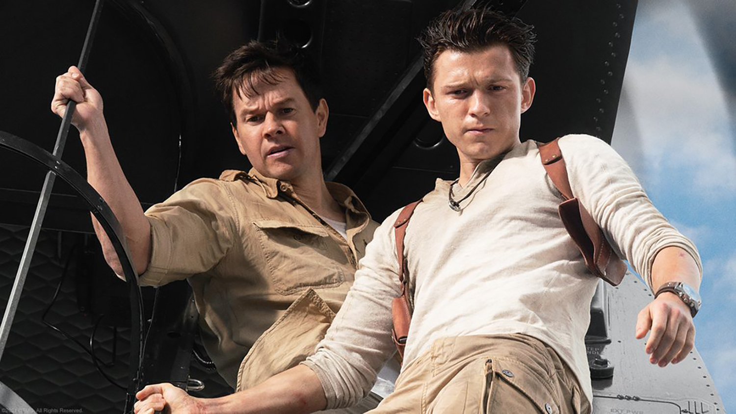 Mark Wahlberg as Victor Sullivan and Tom Holland as Nathan Drake in the Uncharted movie, which featured dozens of Easter eggs from the games