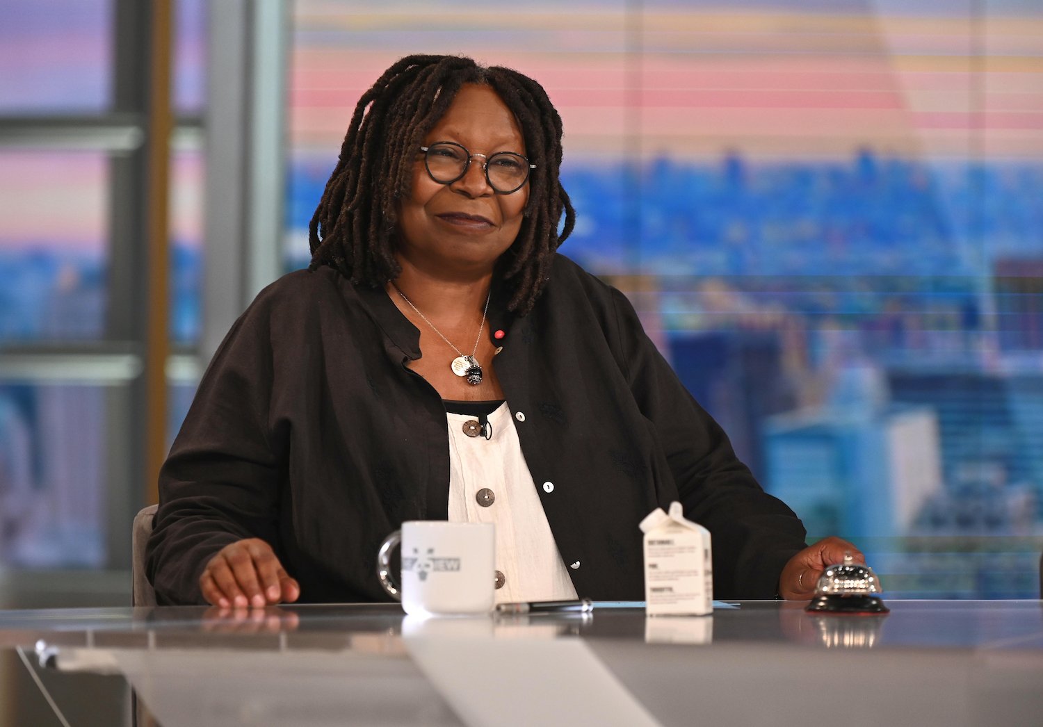 Whoopi Goldberg sitting at the table on the set of 'The View'