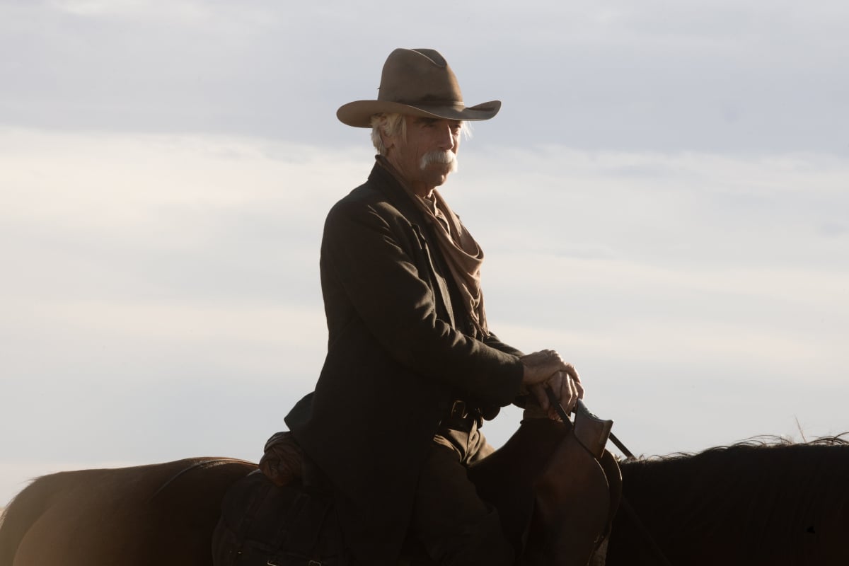 1883 star Sam Elliott rides horseback wearing his loose hat