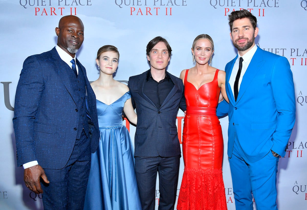 Djimon Hounsou, Millicent Simmonds, Cillian Murphy, Emily Blunt, and John Krasinski all dressed up in front of the ‘A Quiet Place Part II’ logo