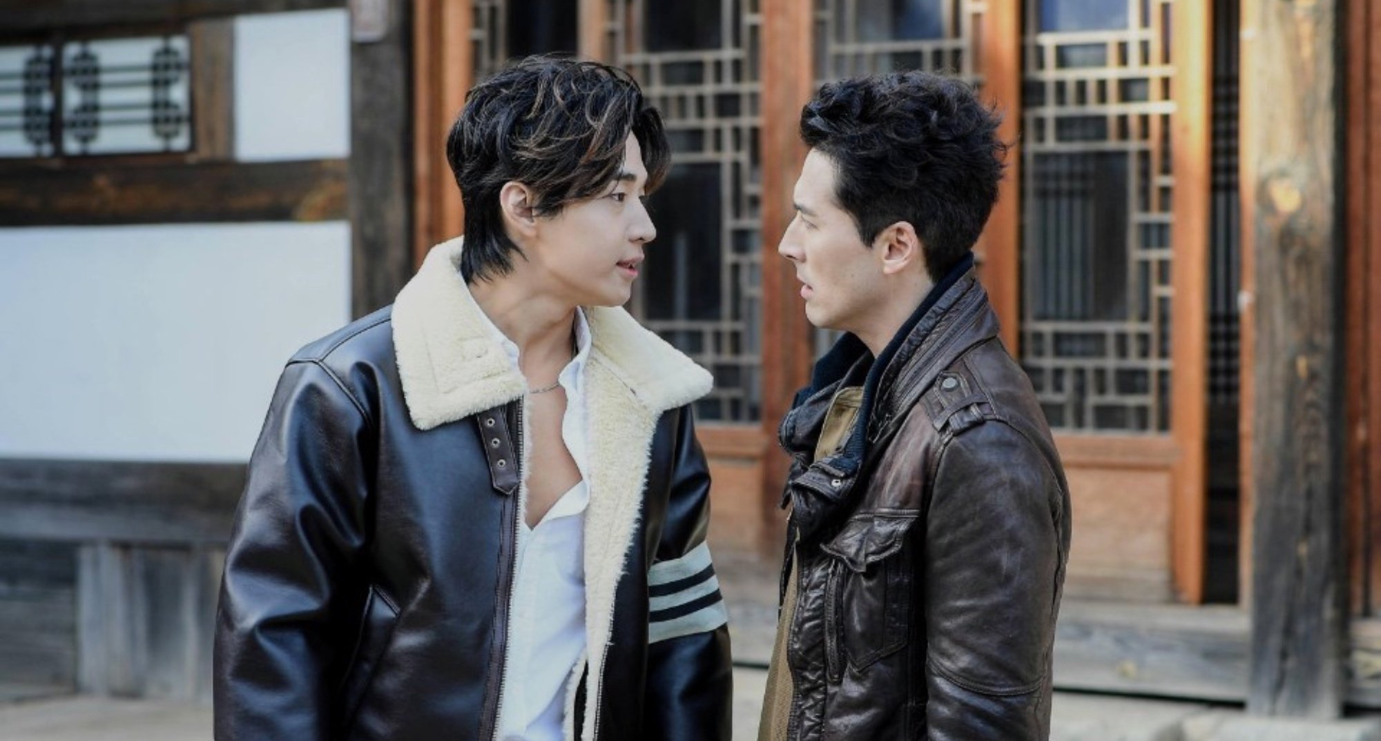 Actors Henry Lau and Sean Dulake in 'Dramaworld' Season 2 scene facing each other.
