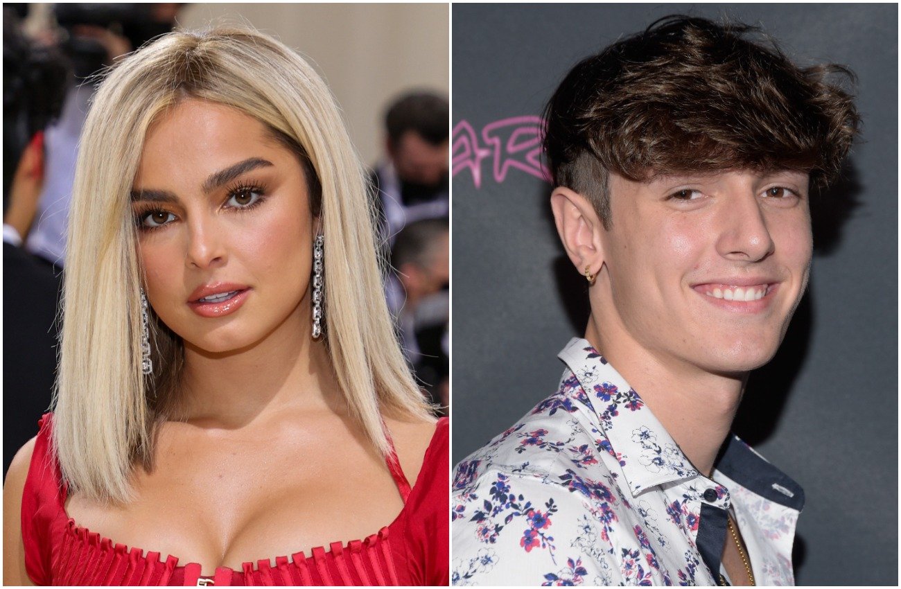 Addison Rae with straight blonde hair while wearing a red outfit, Bryce Hall wearing a white shirt and standing in front of a gray background