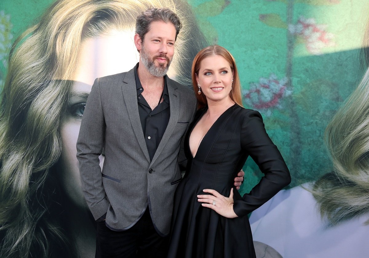 Amy Adams smiling alongside her husband Darren Le Gallo.