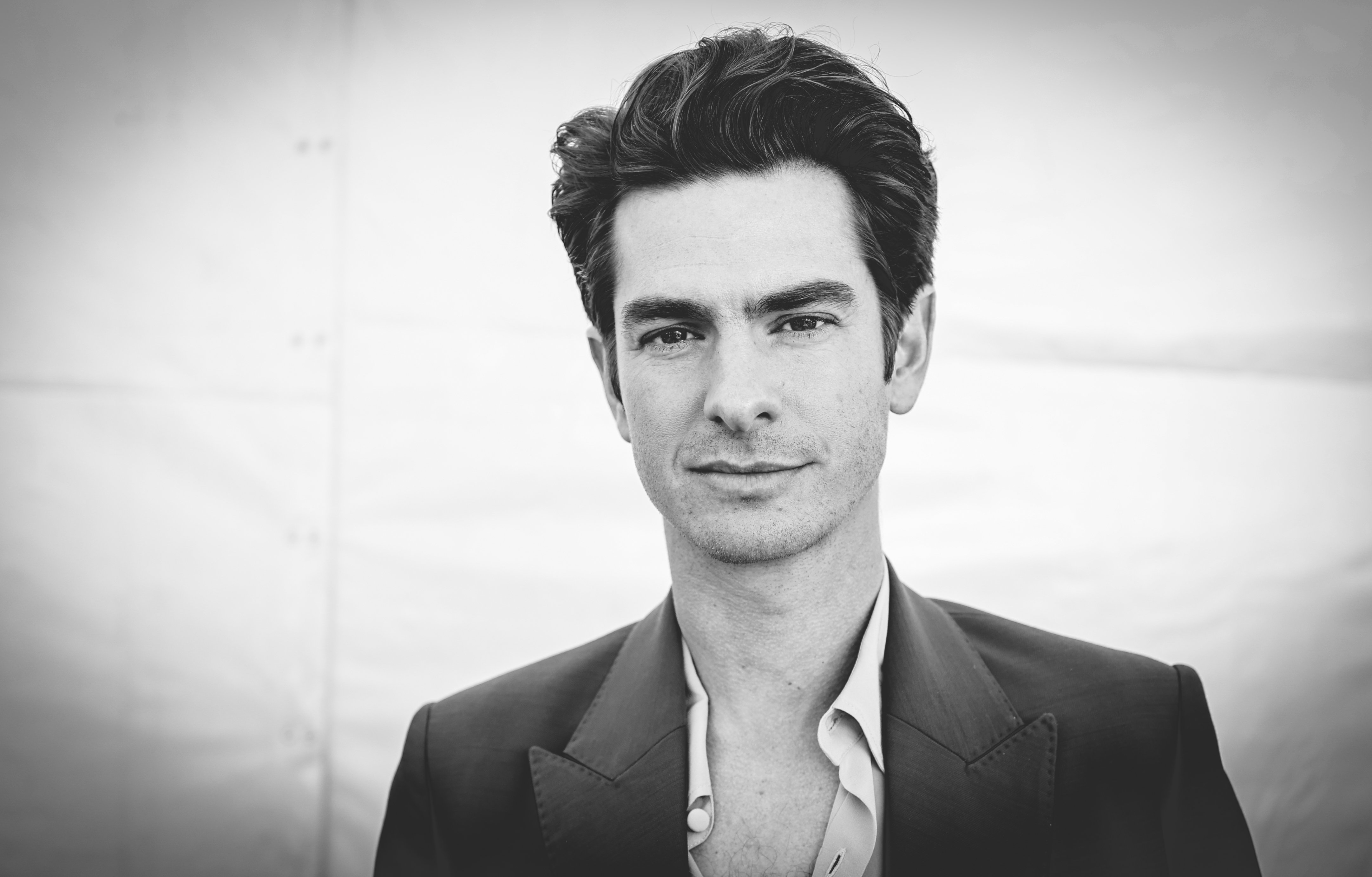 Black and white portrait of Andrew Garfield, star of the upcoming Hulu series 'Under the Banner of Heaven' 