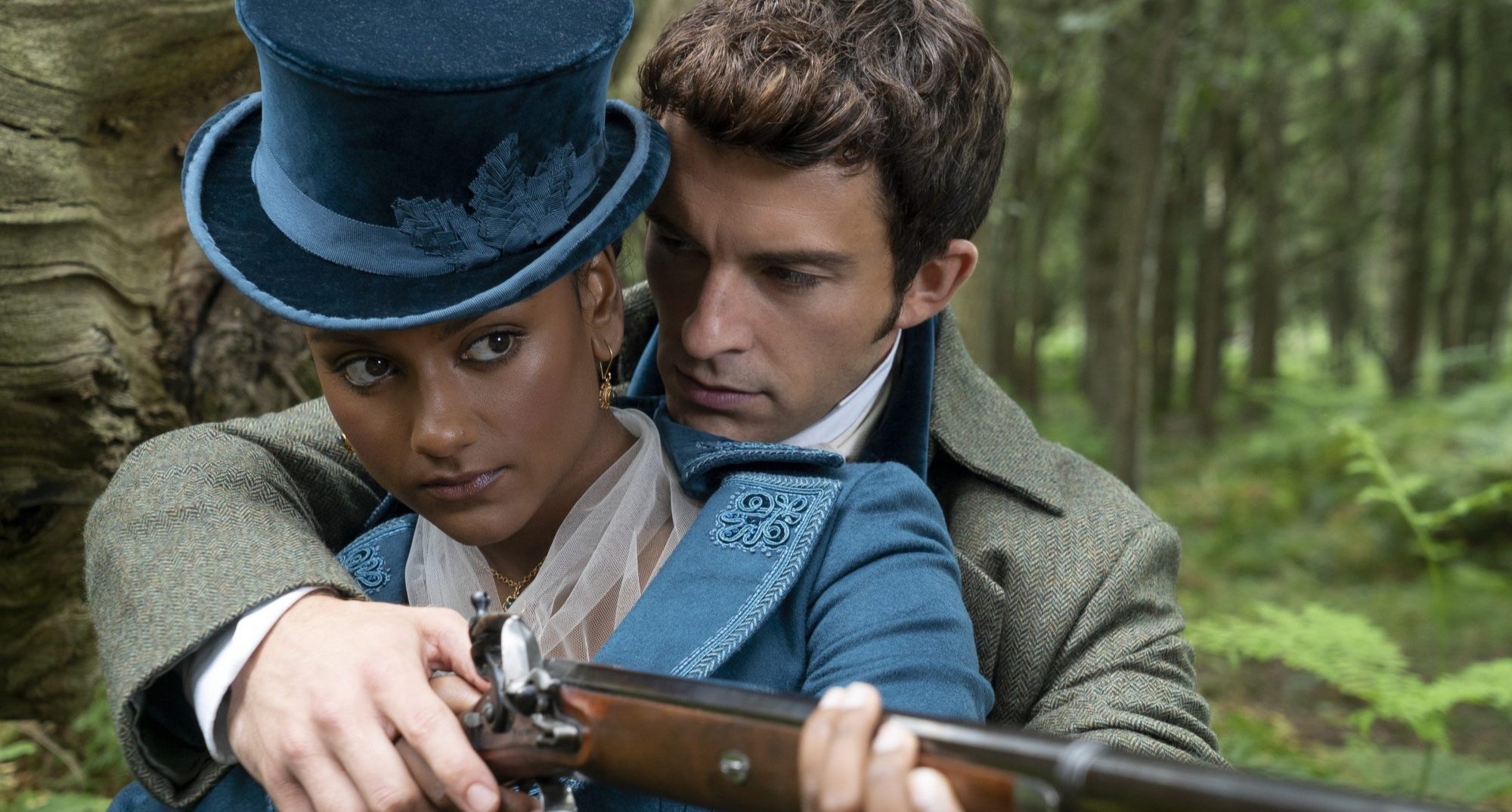 Anthony Bridgerton and Kate in 'Bridgerton' Season 2 holding hunting rifle.