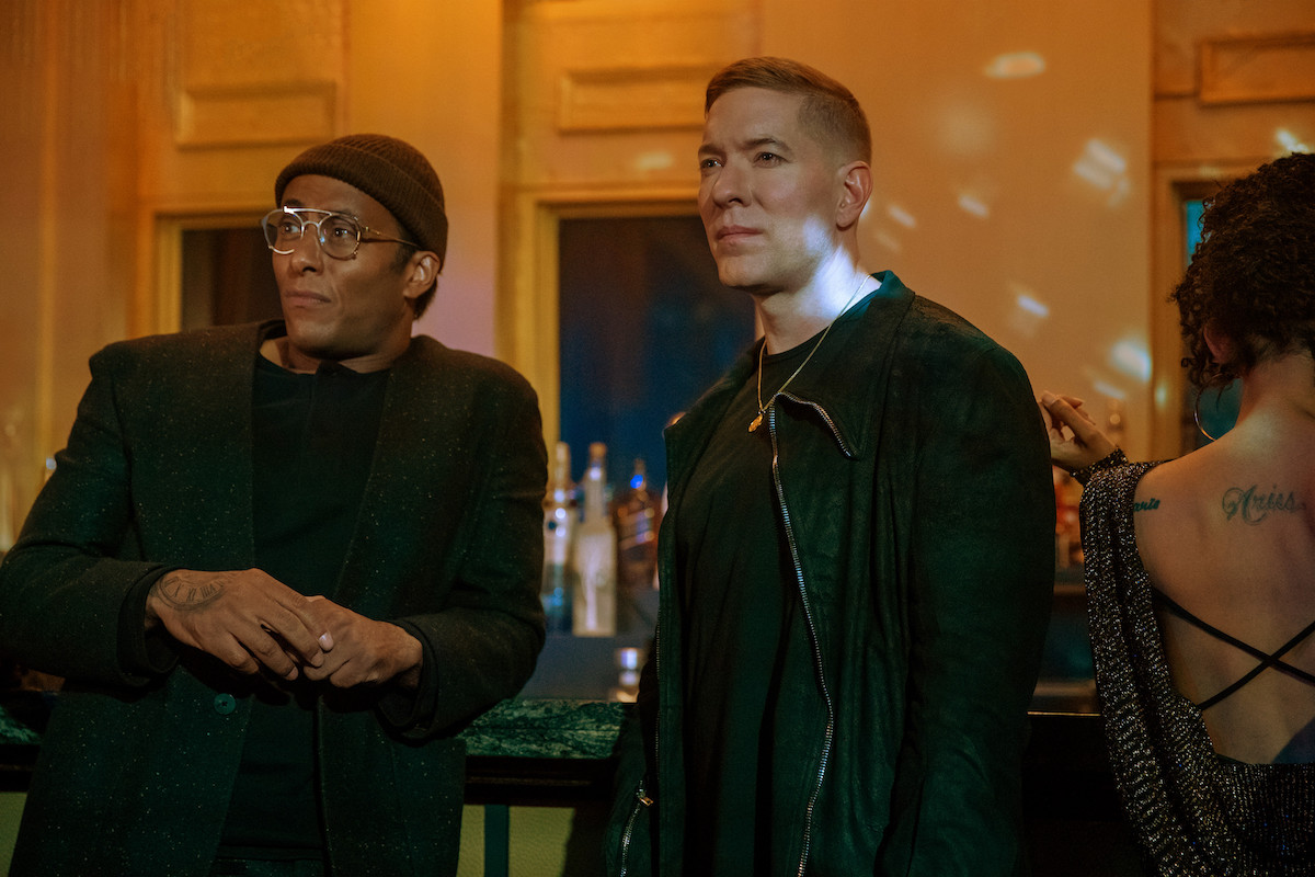 Anthony Fleming as JP Gipps and Joseph Sikora as Tommy Egan wearing all black in a club in 'Power Book IV: Force'