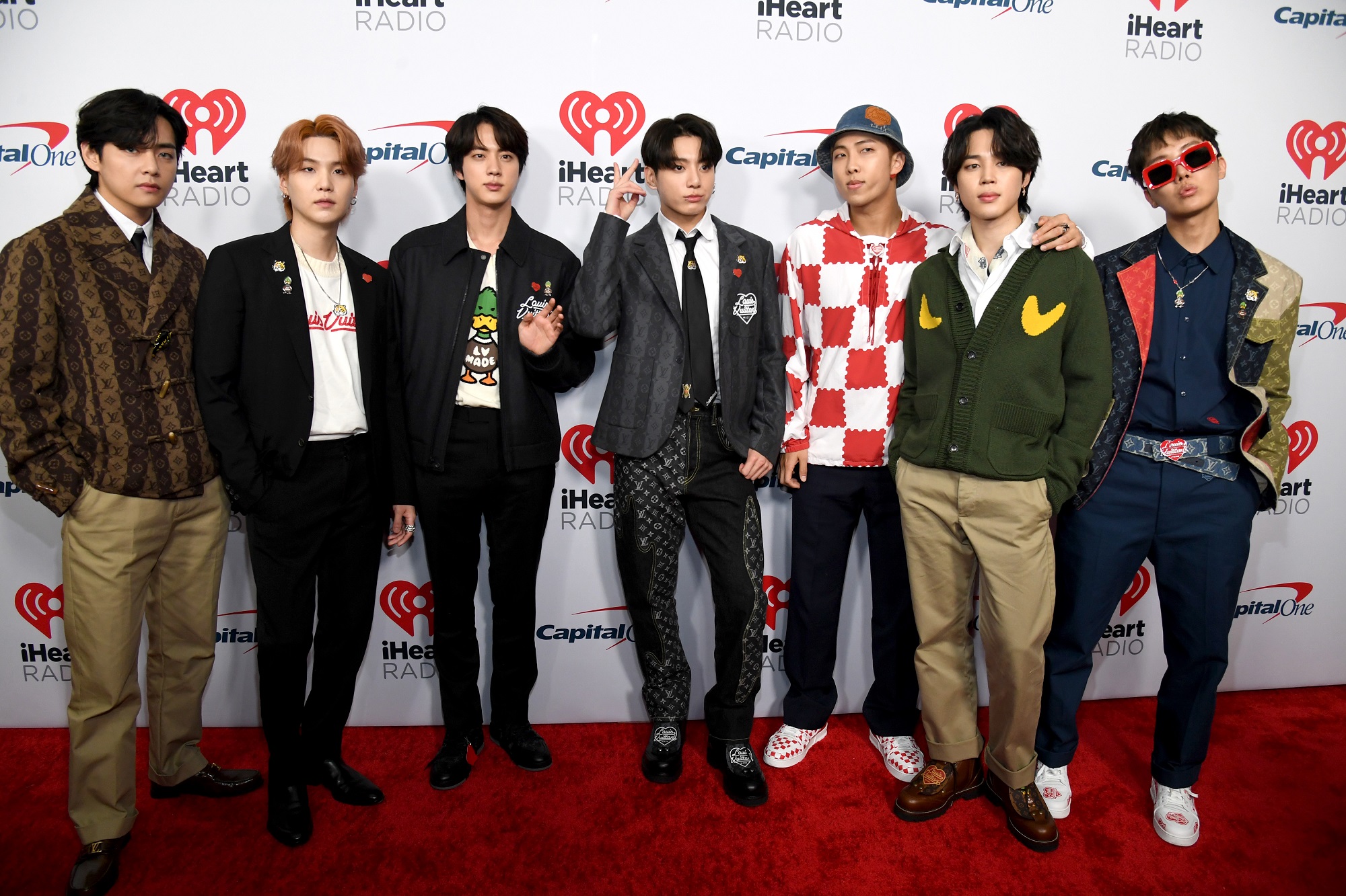 V, Suga, Jin, Jungkook, RM, Jimin, and J-Hope of BTS attend iHeartRadio 102.7 KIIS FM's Jingle Ball 2021