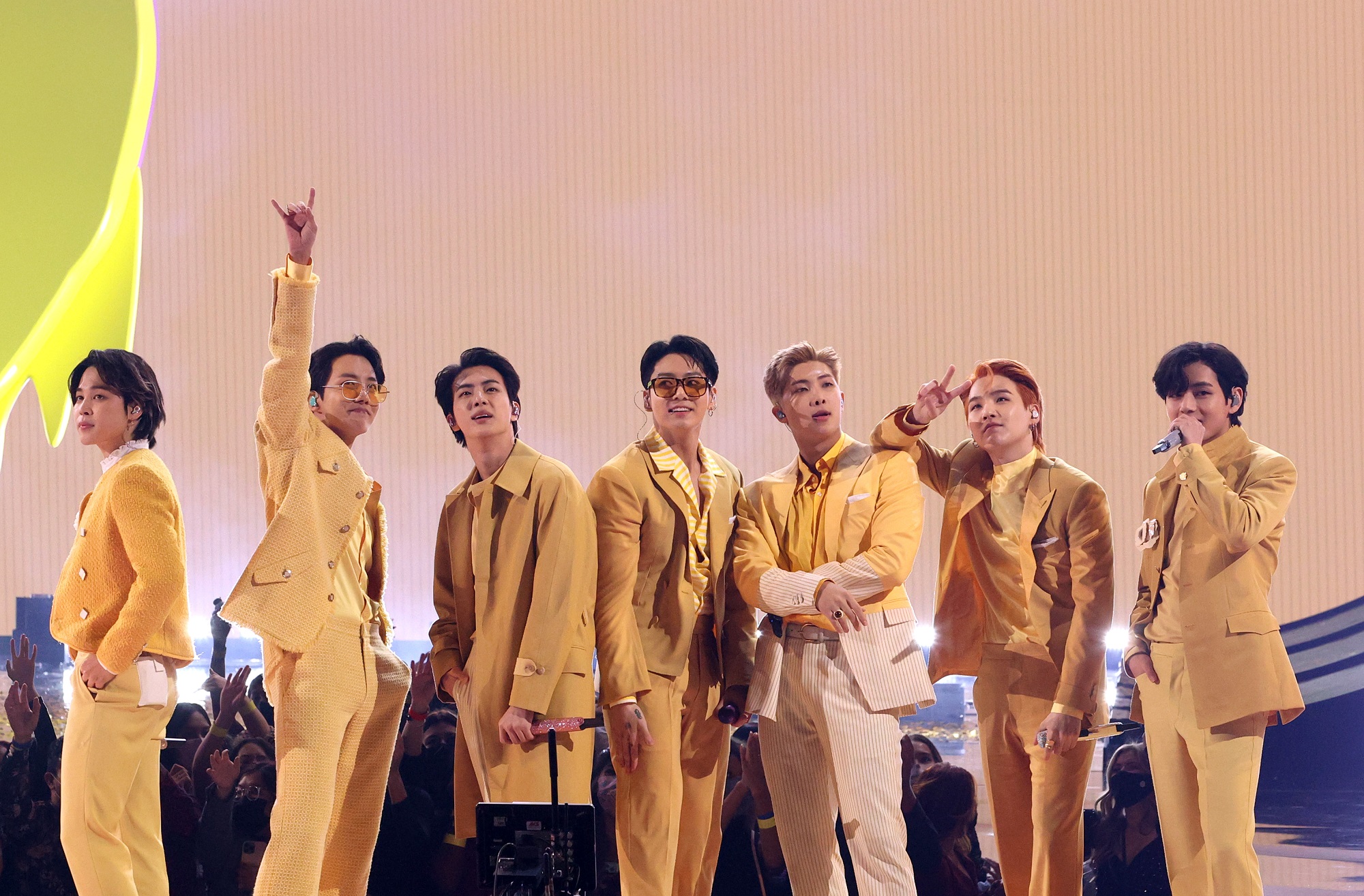 Jimin, J-Hope, Jin, Jungkook, RM, Suga, and V of BTS perform during the 2021 American Music Awards