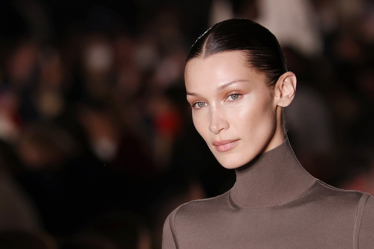 Bella Hadid walks a runway.