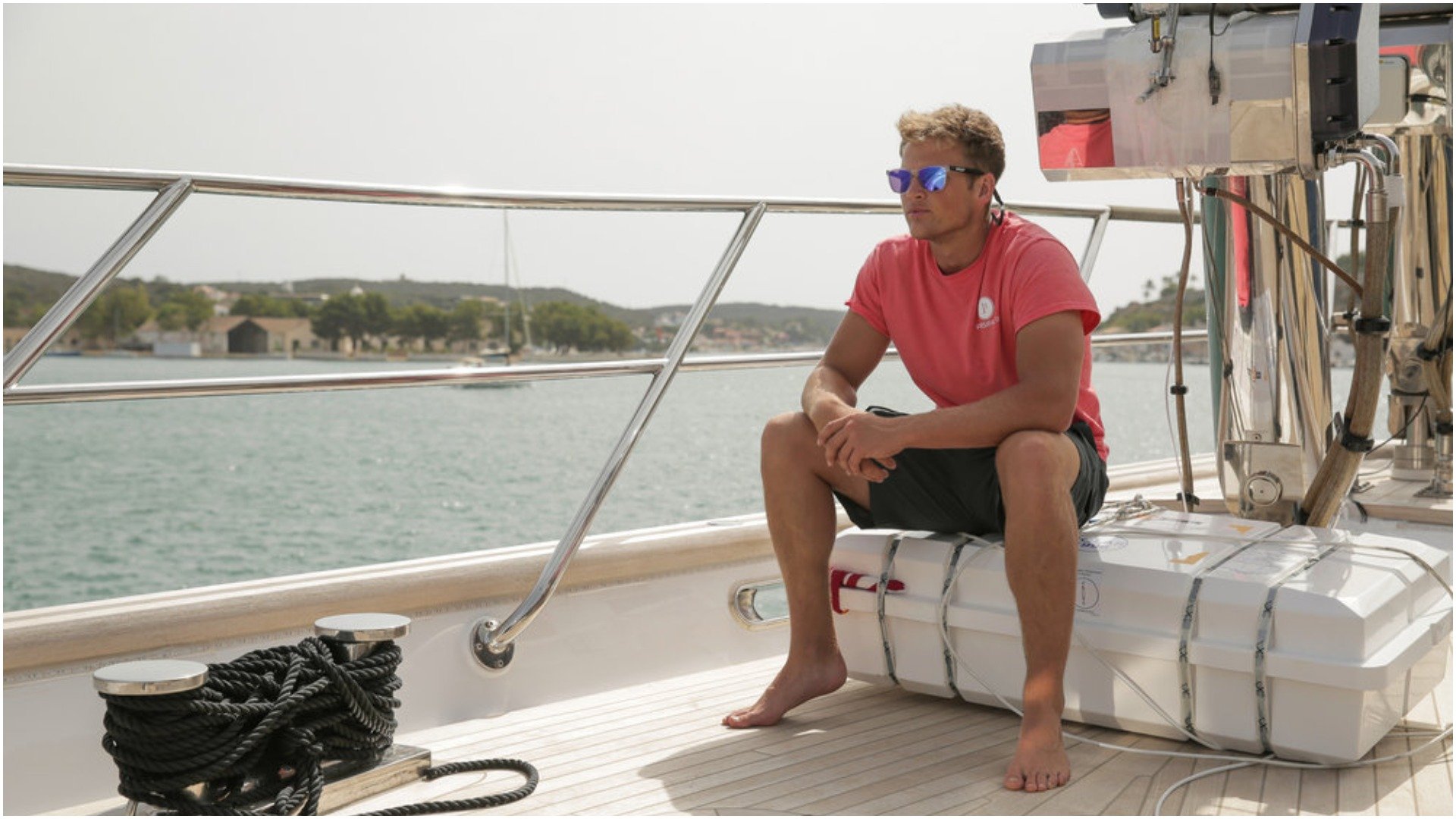 Deckhand Tom Pearson from 'Below Deck Sailing Yacht' sits on deck on Parsifal III 