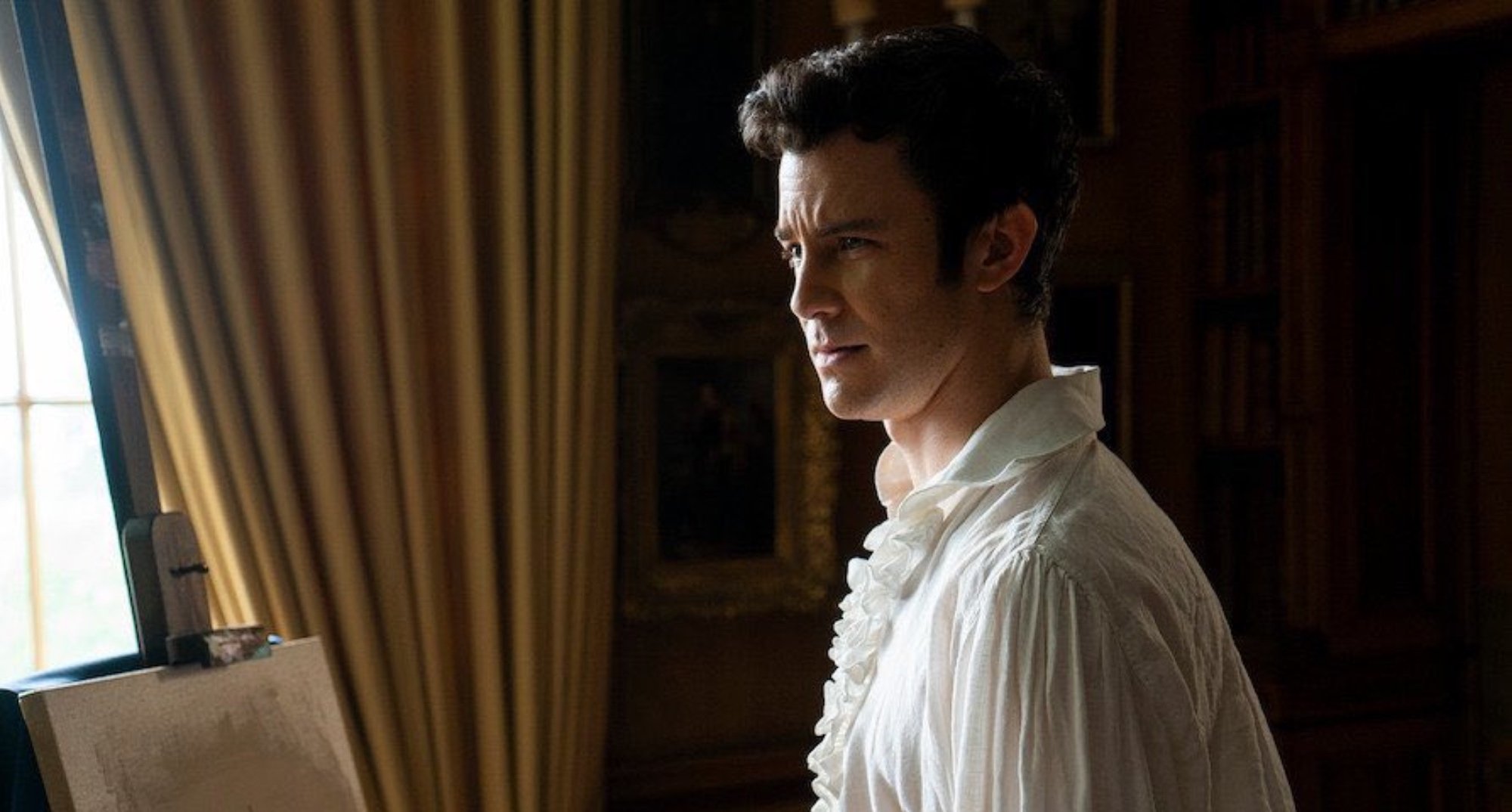 Benedict in 'Bridgerton' Season 2 wearing white shirt and painting.