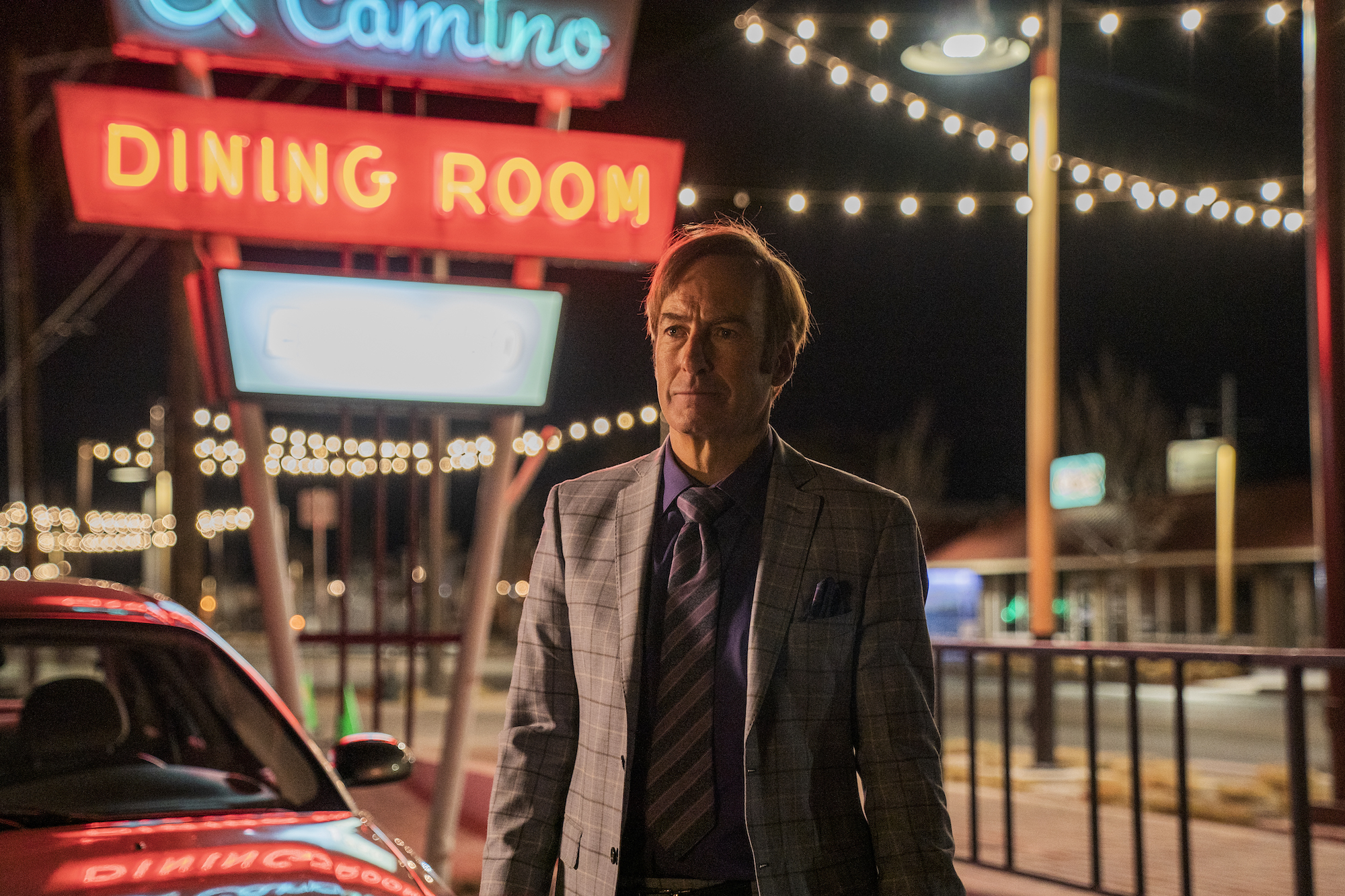 'Better Call Saul: Saul Goodman (Bob Odenkirk) stands in the El Camino parking lot