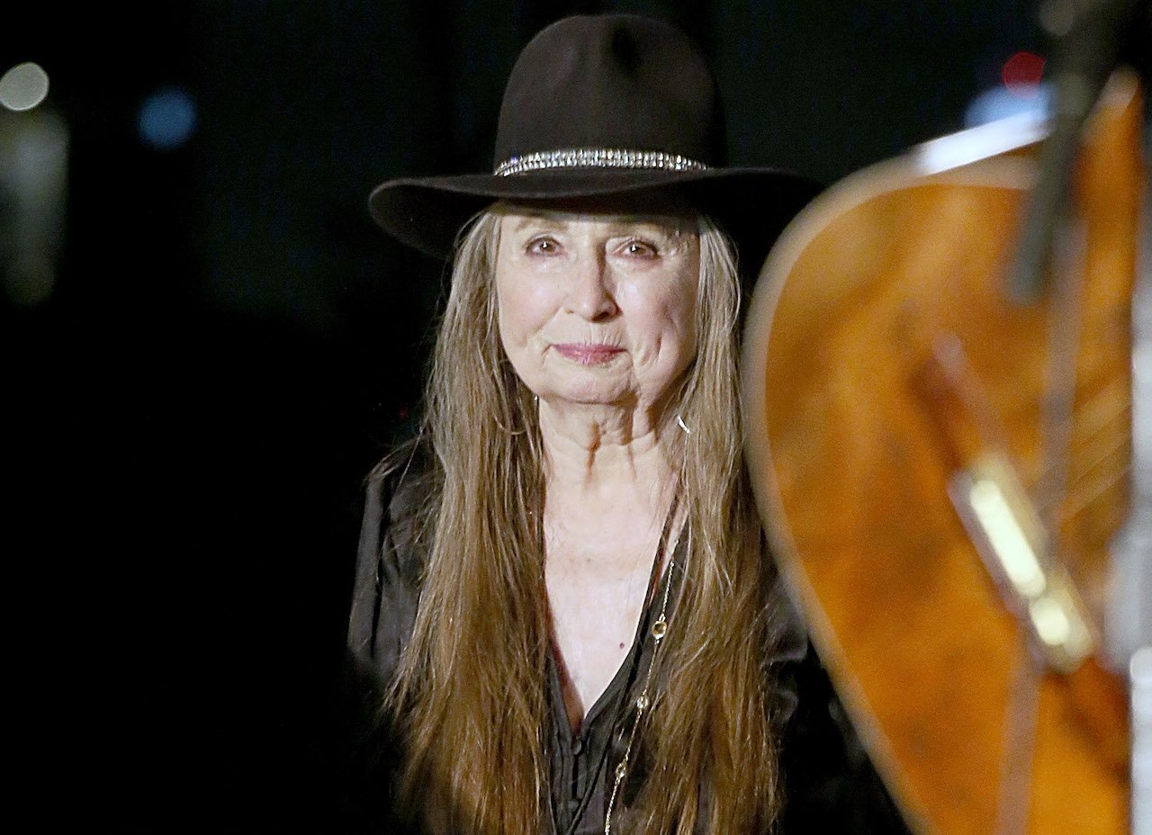 Bobbie Nelson in a black top and black cowboy hat 