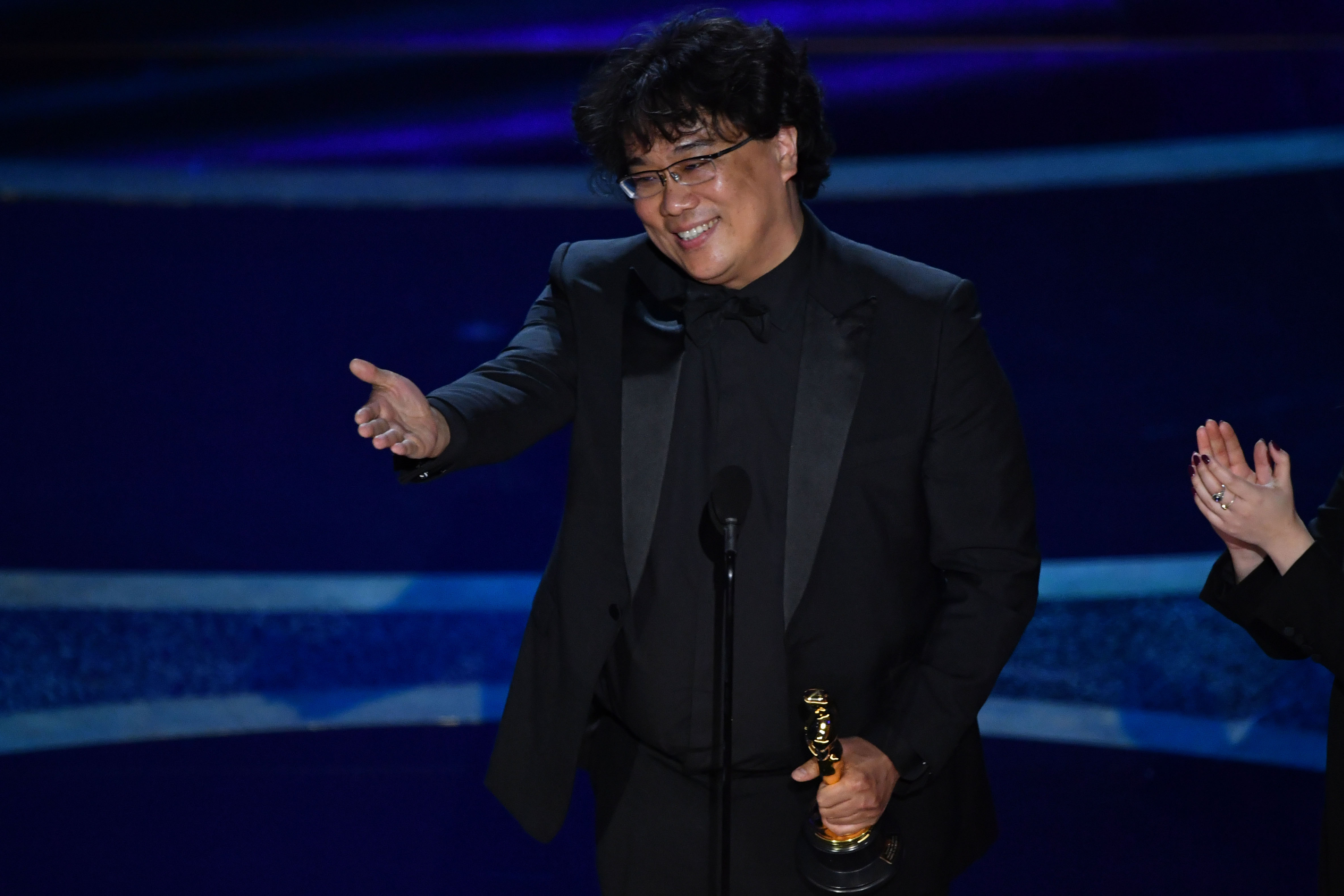 Bong Joon-Ho accepts the award for Best Director at the 92nd Academy Awards.