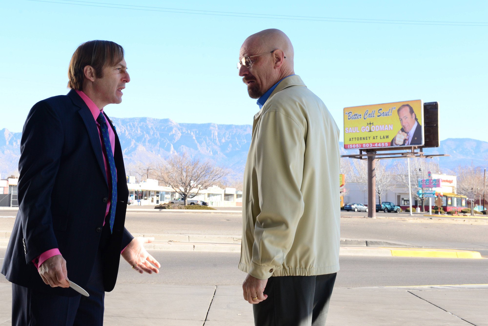 'Breaking Bad': Bob Odenkirk and Bryan Cranston talk in front of a Saul billboard