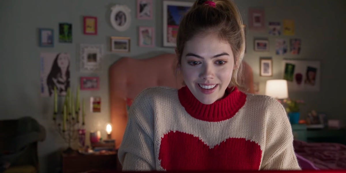 McKaley Miller as Anna in Butter. Anna is wearing a white sweater with a red heart on it.