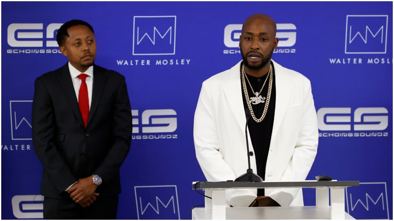 Ceaser Emanuel standing next to his lawyer, Walter Mosley