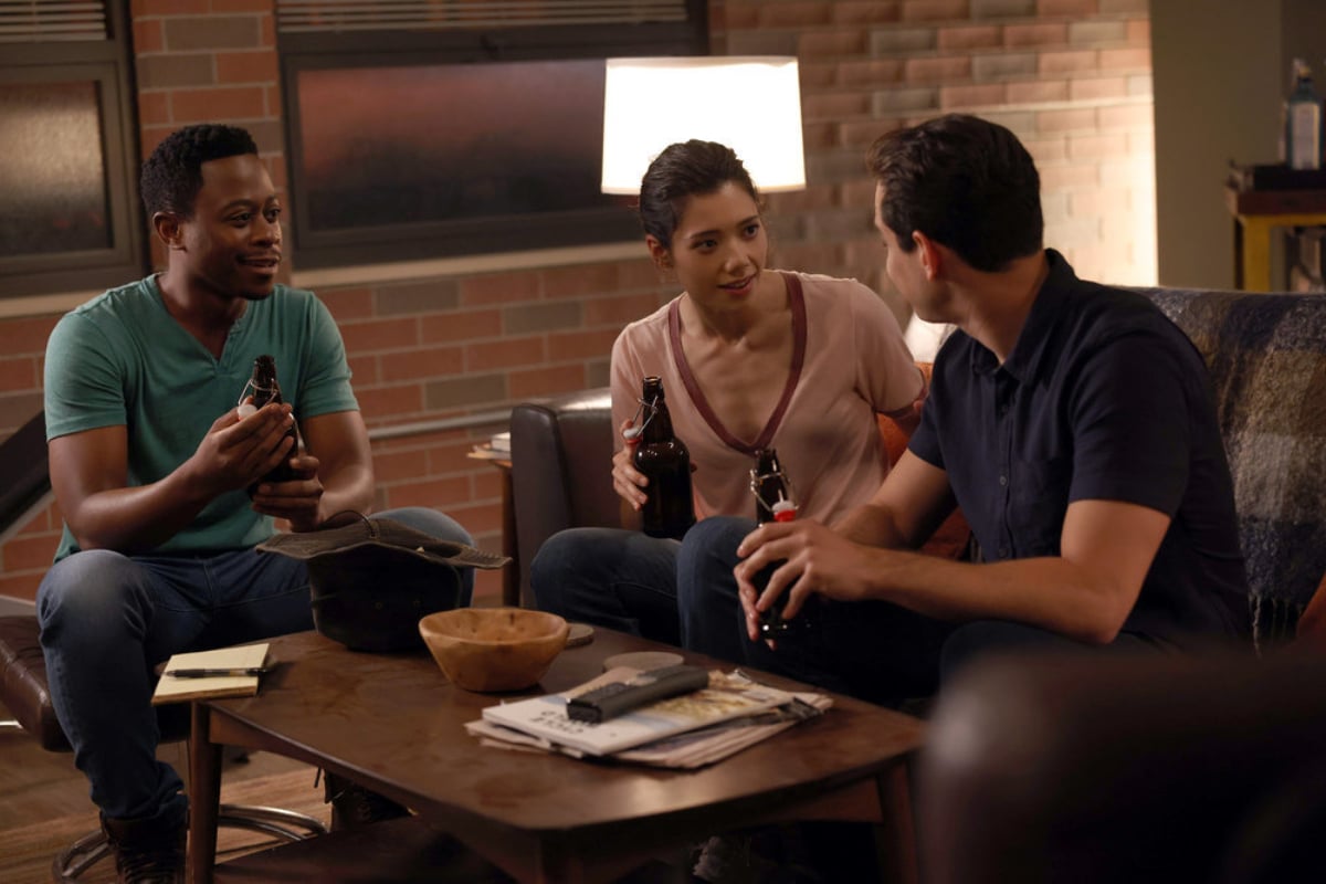 Gallo, Ritter, and Violet sit next to each other in Chicago Fire Season 10. 