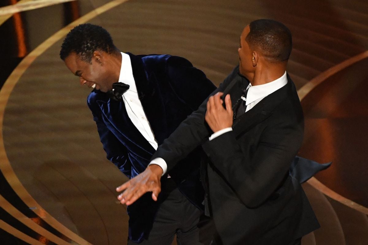 Will Smith slaps Chris Rock at the 2022 Oscars.