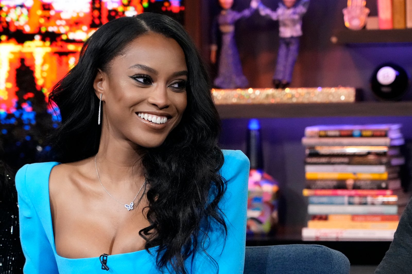 Ciara Miller from 'Summer House' smiles while being a guest on 'WWHL'
