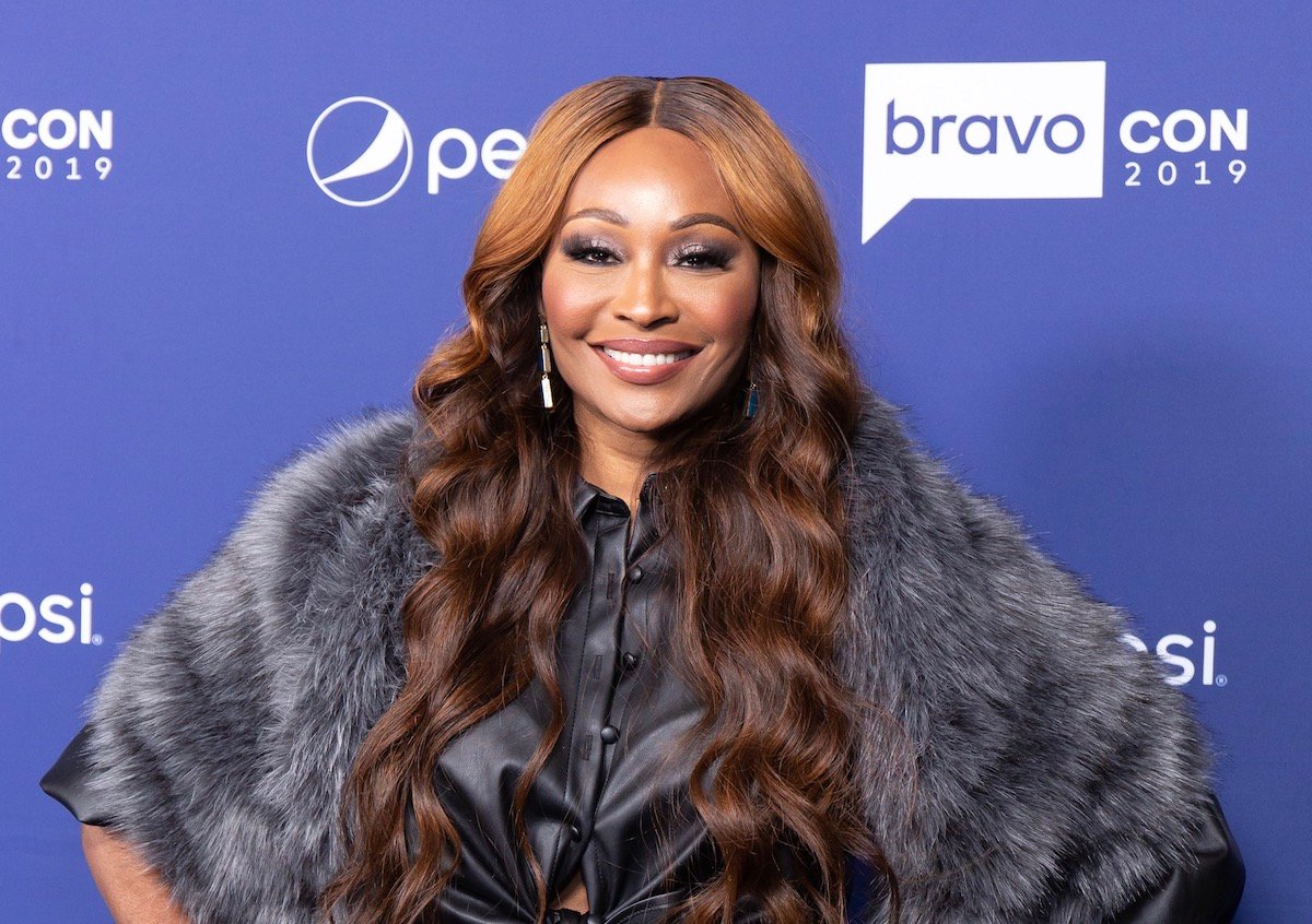 Photo of Cynthia Bailey, wearing a fur coat, at BravoCon in 2019 