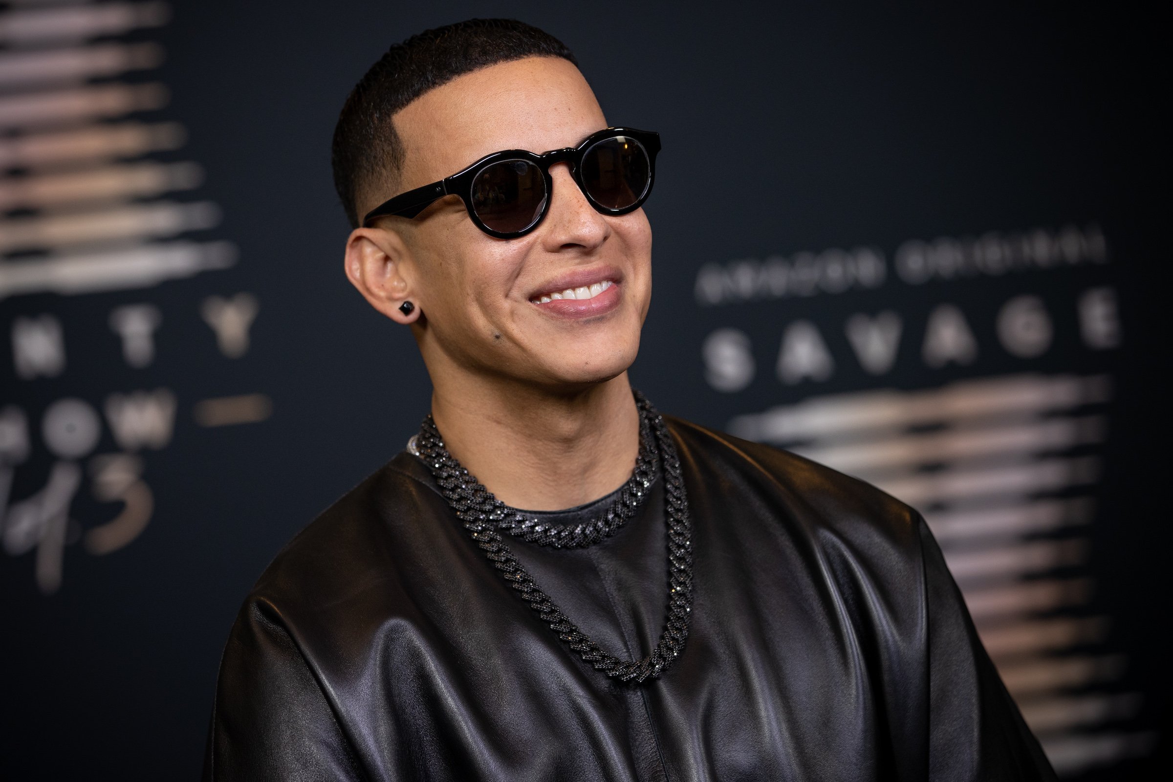 Daddy Yankee wearing sunglasses and black leather