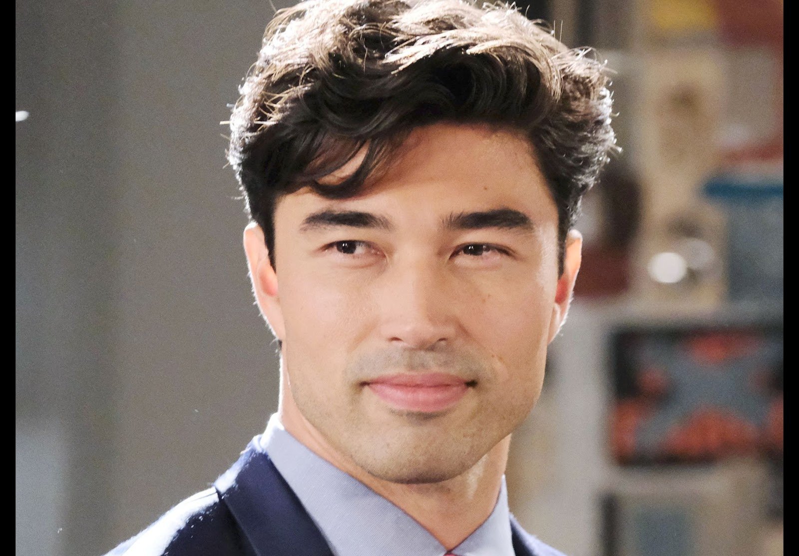 Days of Our Lives star Remington Hoffman, who plays Li Shin, in a blue tailored suit
