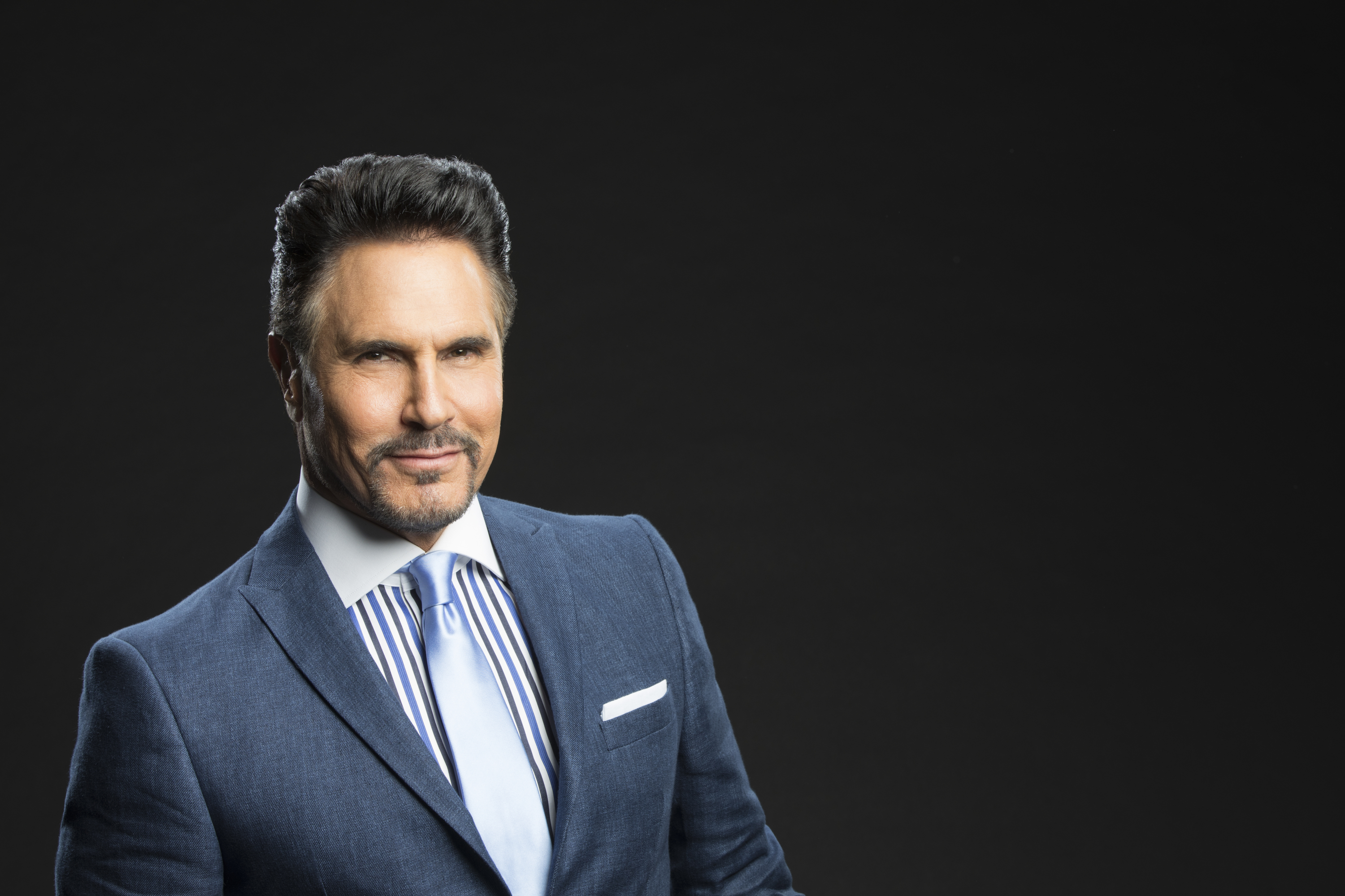 'The Bold and the Beautiful' actor Don Diamont wearing a blue suit and standing in front of a black backdrop.