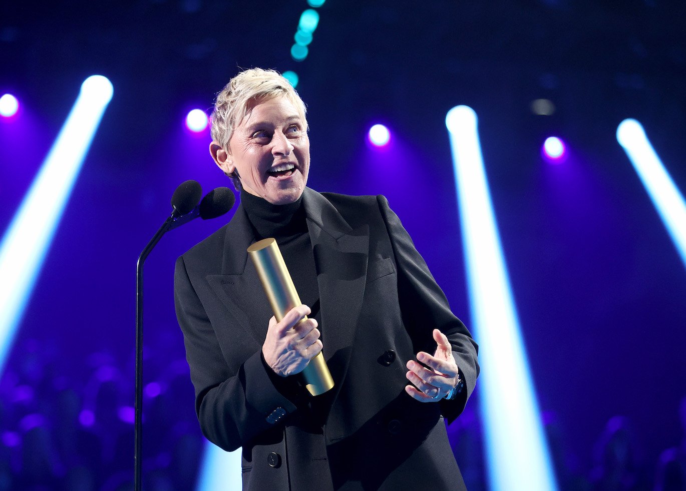 Ellen DeGeneres from 'The Ellen DeGeneres Show' smiling on stage