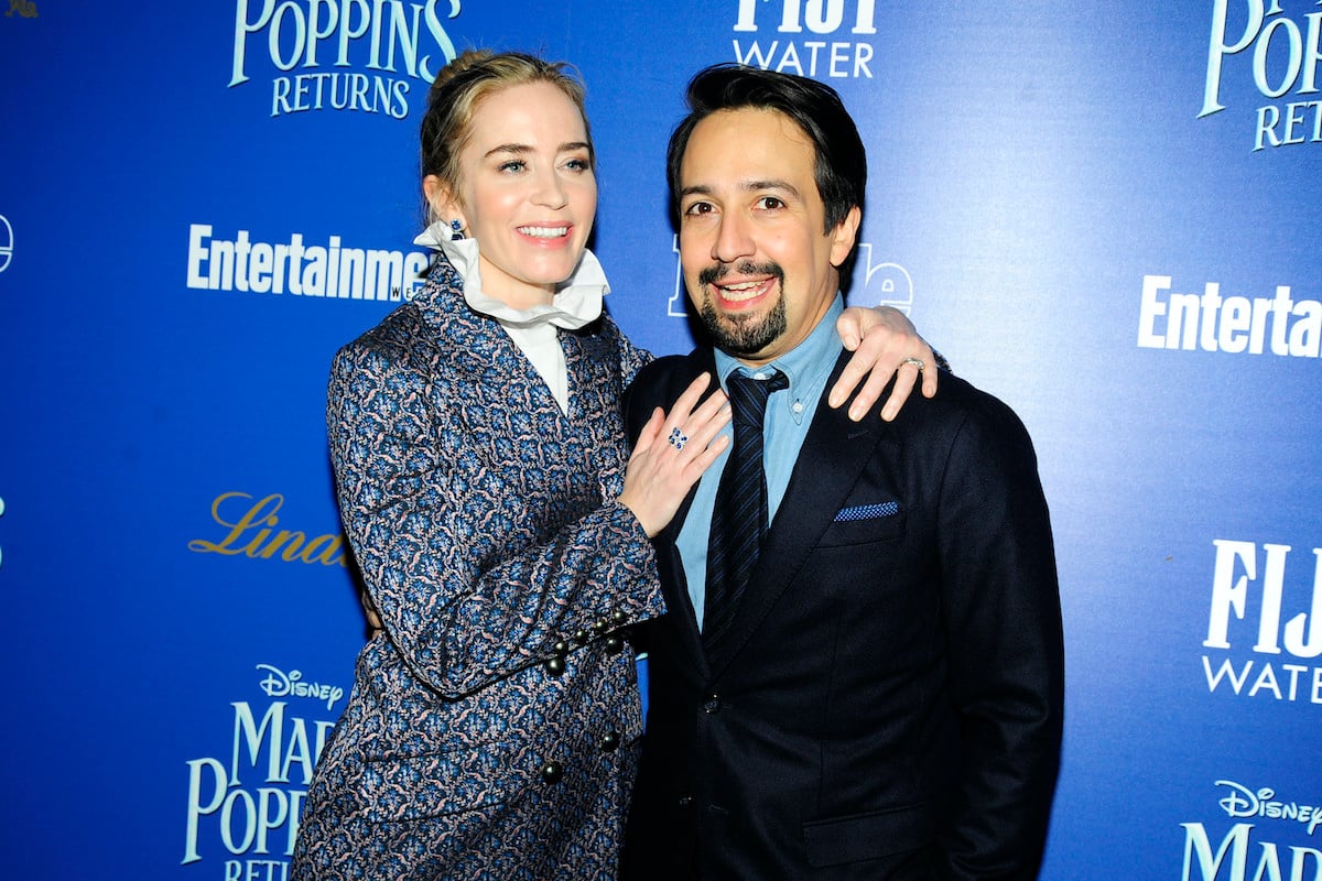 Emily Blunt and Lin-Manuel Miranda pose on the red carpet