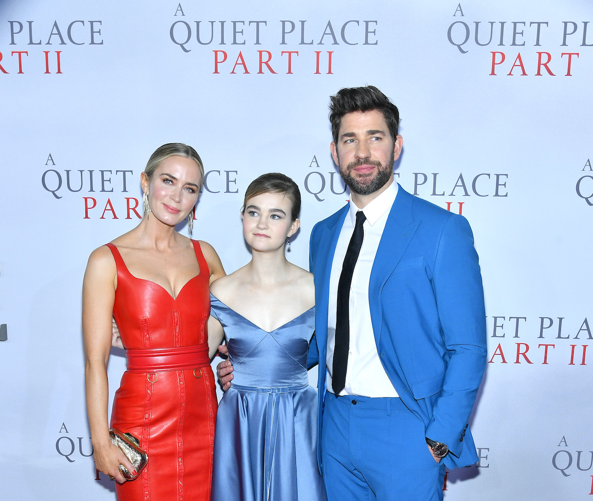 Emily Blunt, Millicent Simmonds, and John Krasinski all dressed up in front of the ‘A Quiet Place Part II’
