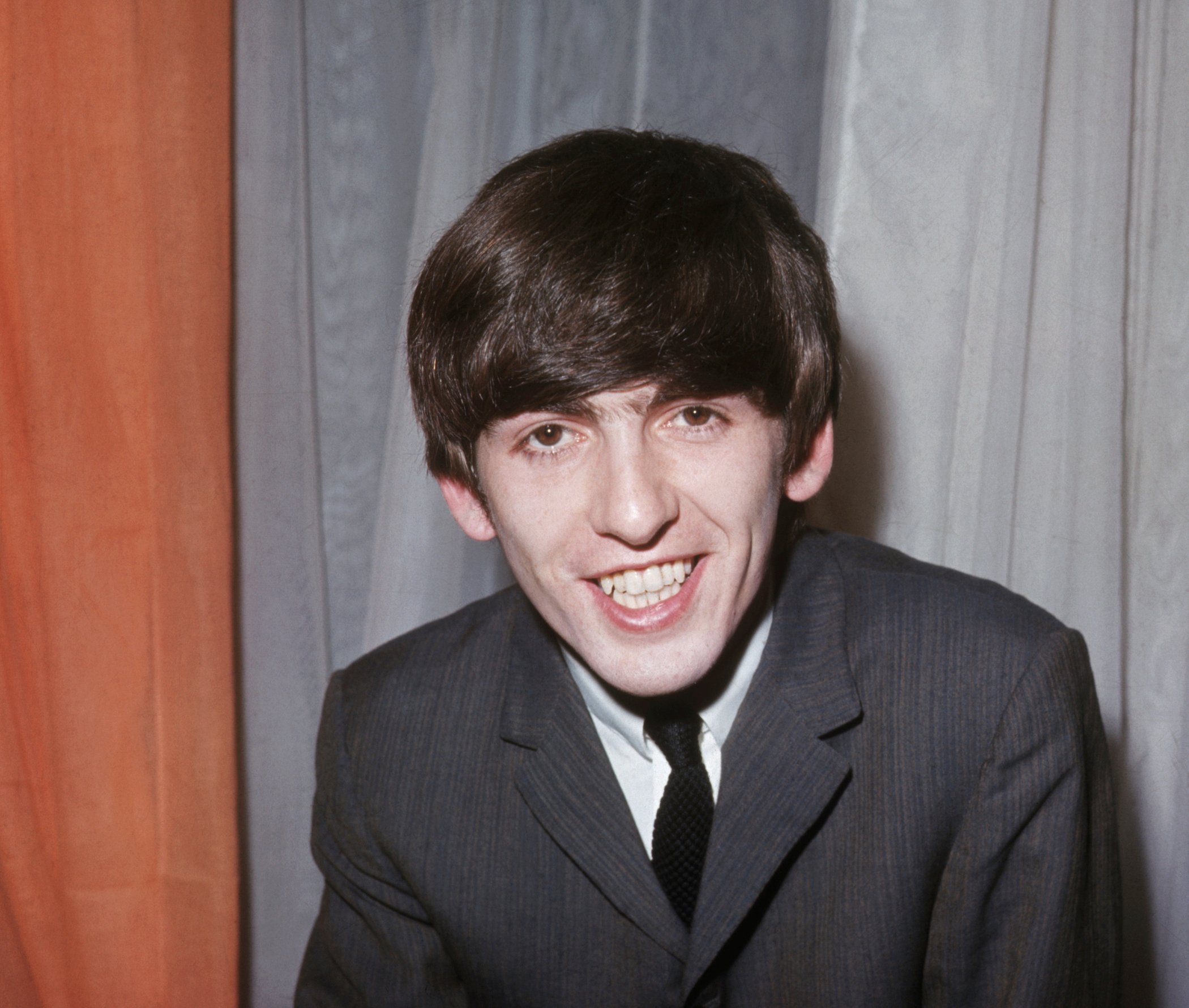 Closeup photograph of George Harrison of the Beatles made in London, 1963