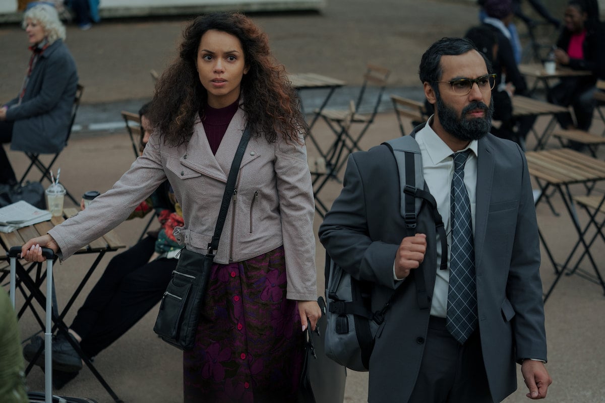 Georgina Campbell walks alongside Kunal Nayyar in a scene from 'Suspicion' Season 1 Episode 6