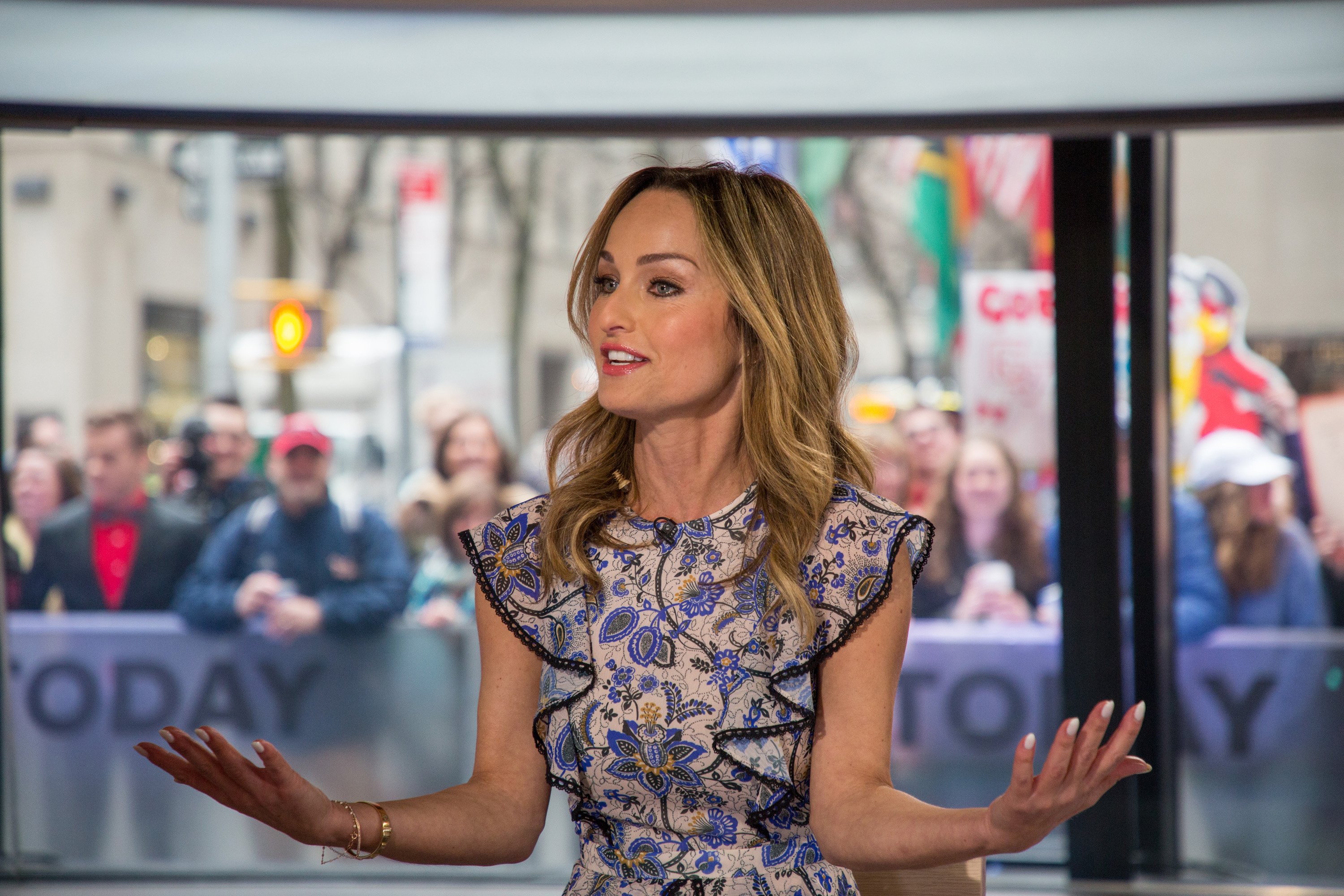 Food Network personality Giada De Laurentiis wears a short-sleeved multi-colored print blouse in a 2018 appearance on 'Today.'