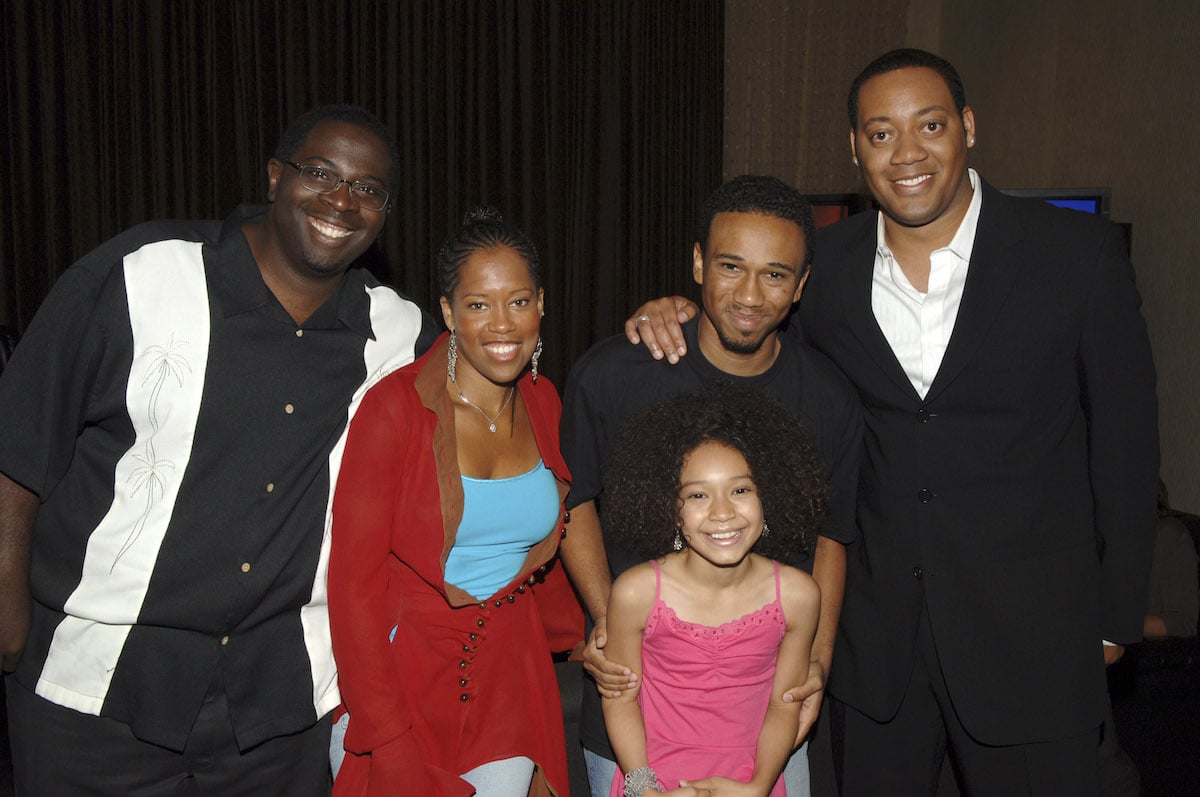Gary Anthony Williams, Regina King, Aaron McGruder, creator and executive producer, Cedric Yarbrough, and Gabby Soleil smile for a photo as The Boondocks cast
