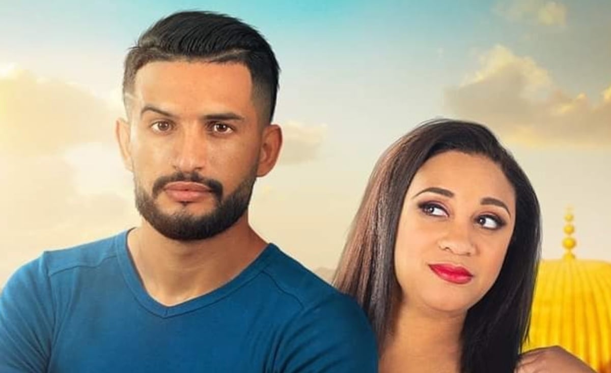 Hamza wears a blue shirt and stands next to Memphis in front of a colorful background for '90 Day Fiancé: Before the 90 Days' Season 5 promo. 