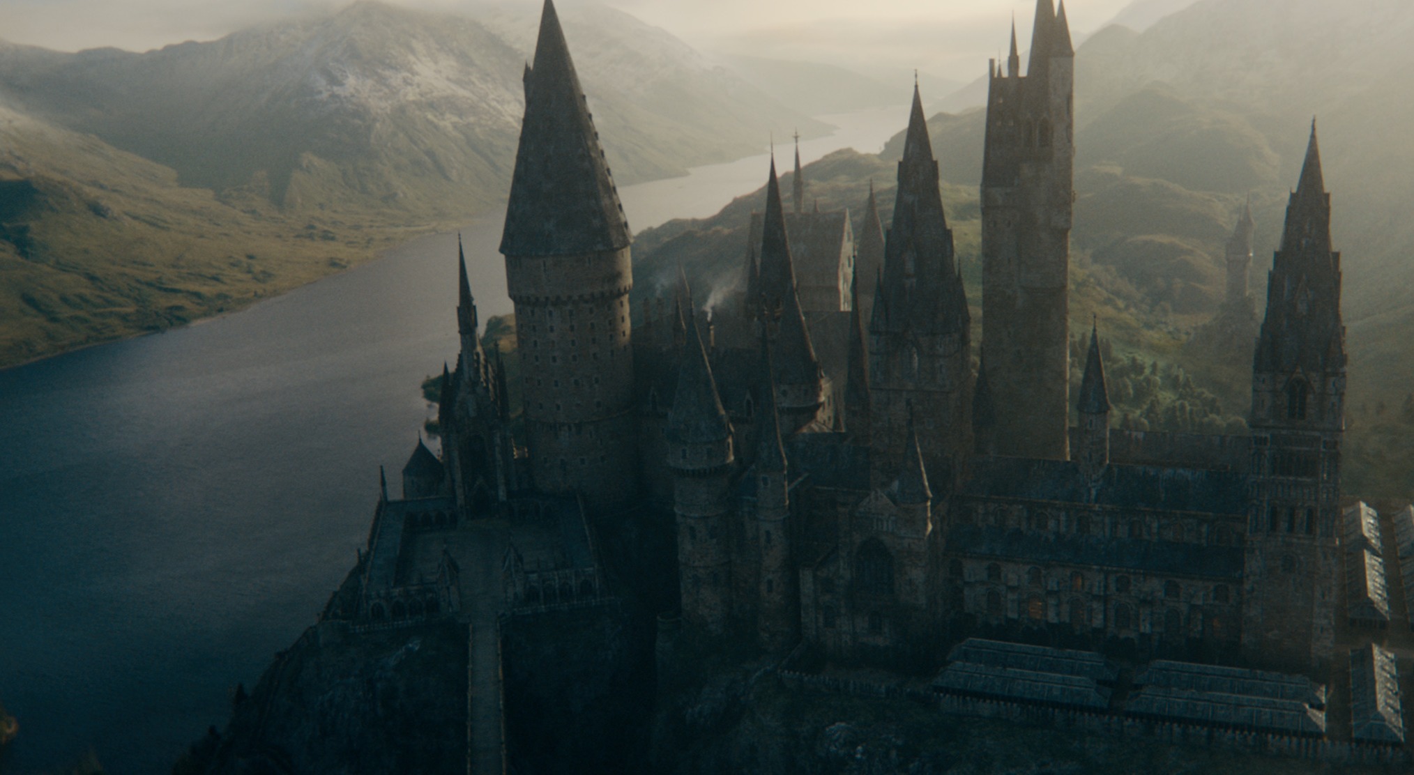 Hogwarts castle in 'Fantastic Beasts: The Secrets of Dumbledore.' It's next to the Great Lake and Forbidden Forest.