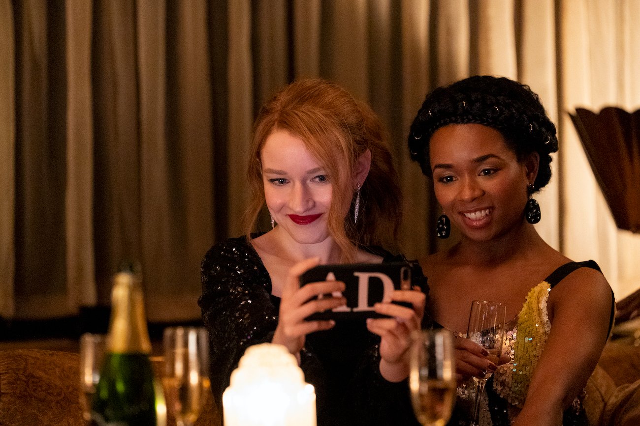 Julia Garner as Anna Delvey, Alexis Floyd as Neff Davis in 'Inventing Anna'