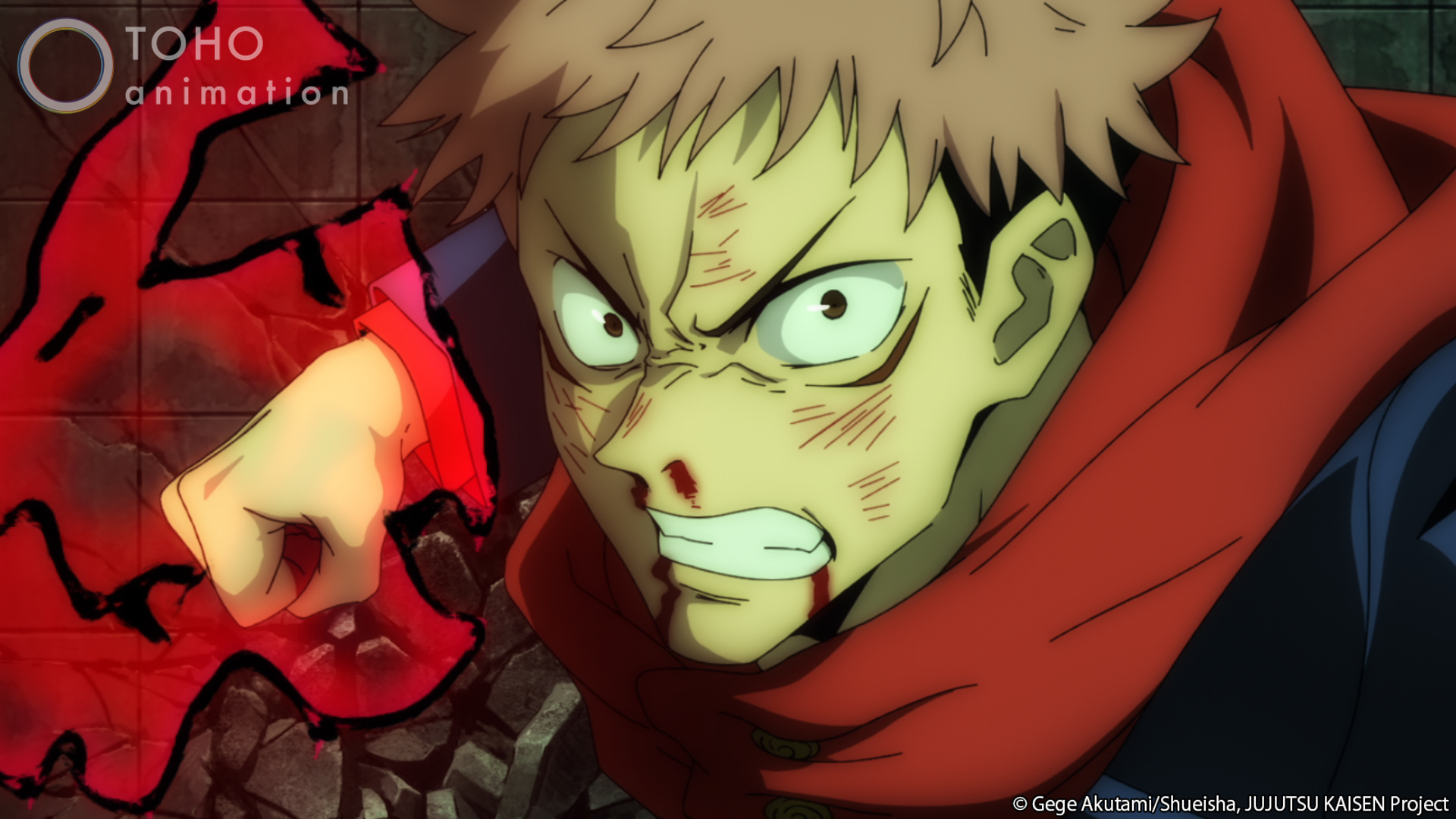 Yuji Itadori in season 1 of the 'Jujutsu Kaisen' anime. He's wielding cursed energy, and there's blood on his face.