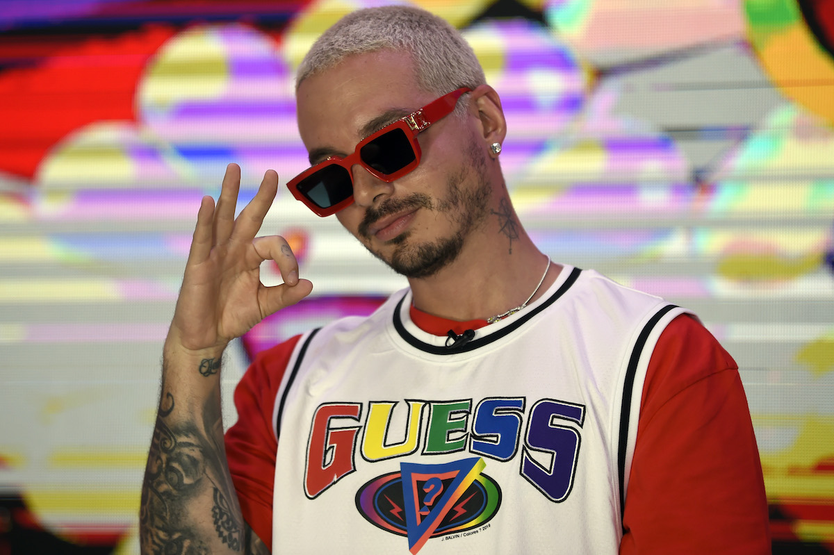 J Balvin wearing a Guess jersey