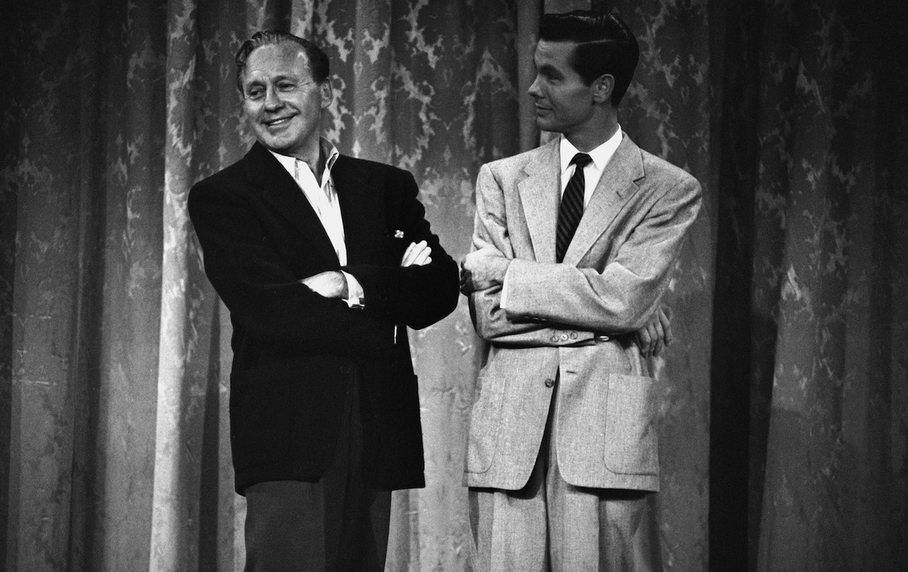 Black and white photo of Jack Benny and Johnny Carson from 'The Jack Benny Show' c. 1955