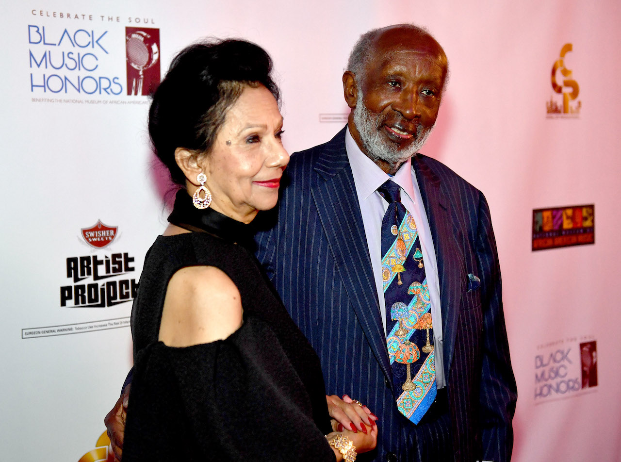 Jacqueline and Clarence Avant pose on the red carpet