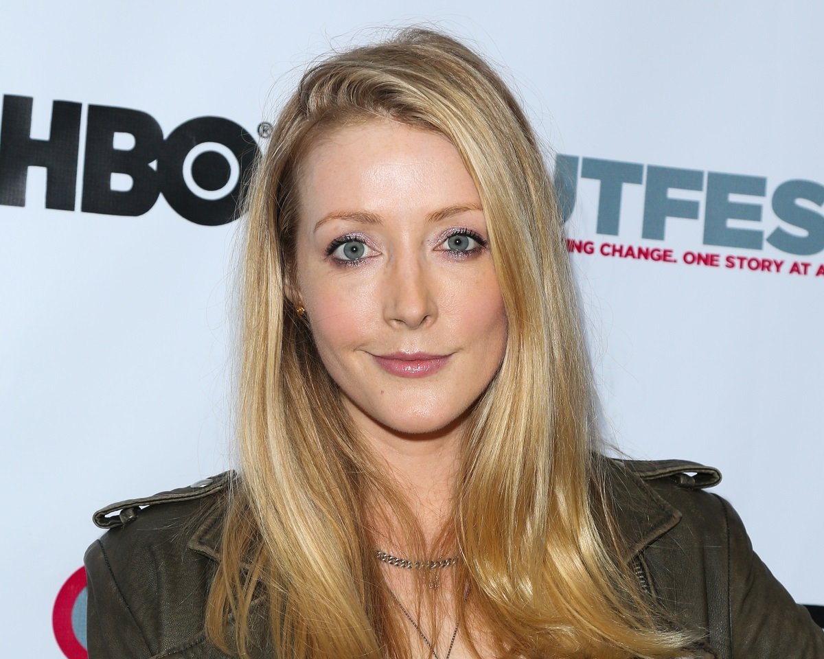'The Bold and the Beautiful' actor Jennifer Finnigan wearing a black leather jacket during a red carpet appearance.