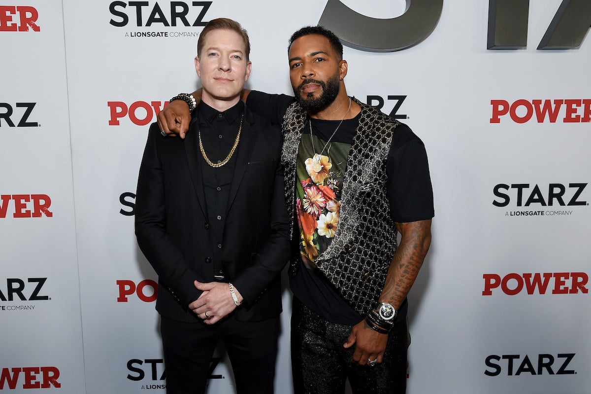 Joseph Sikora and Omari Hardwick pose for a photo in black outfits at an event for their TV show 'Power'