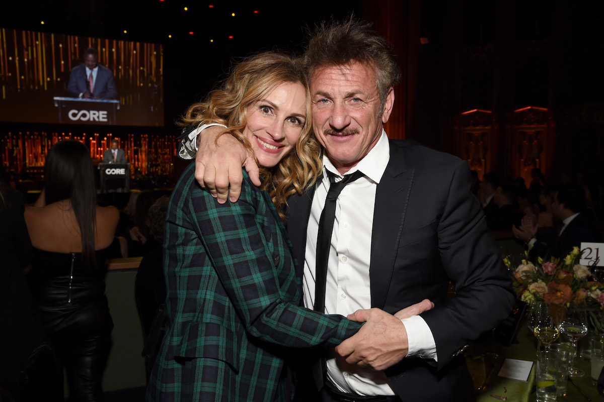 Actors and friends Julia Roberts and Sean Penn hug each other at the 2020 CORE Gala: A Gala Dinner