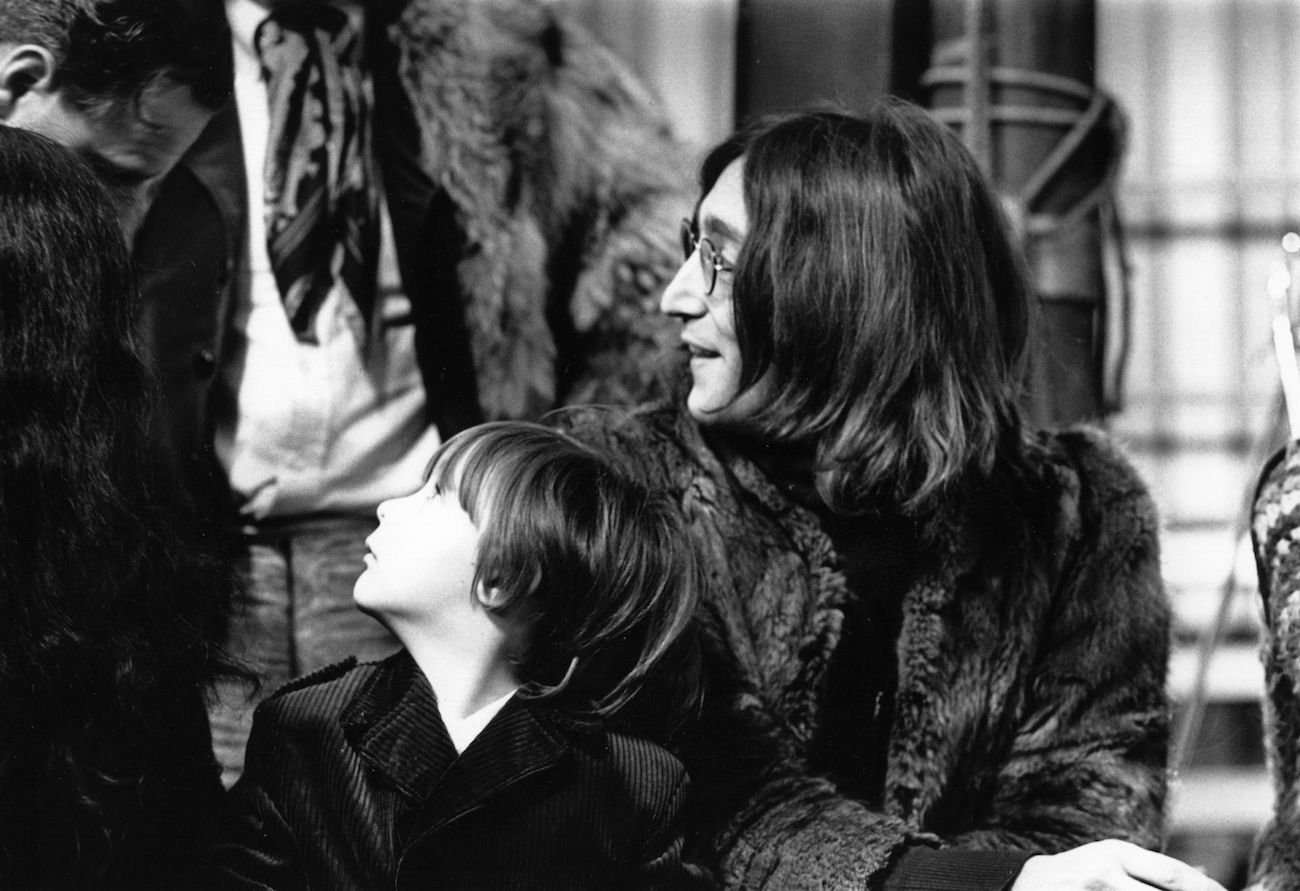 John Lennon and his son, Julian, during filming for The Rolling Stones' 'Rock & Roll Circus' in 1968.