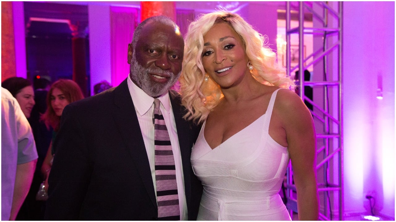 Karen Huger and Ray Huger smiling together at the "Come Together" White House Correspondents' Dinner Pre-Party